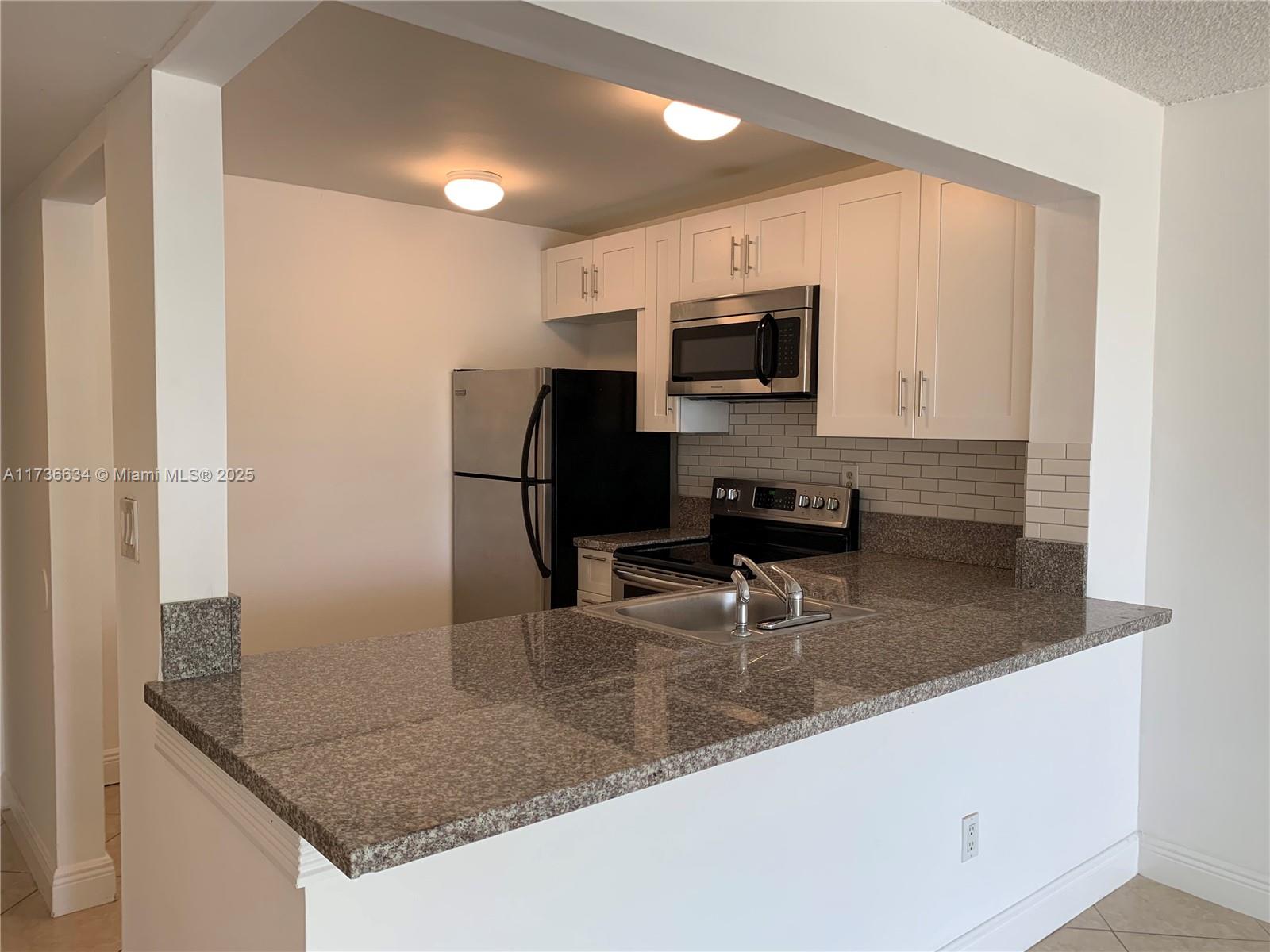 492 NW 165th St Rd # 309 Unit: C-309