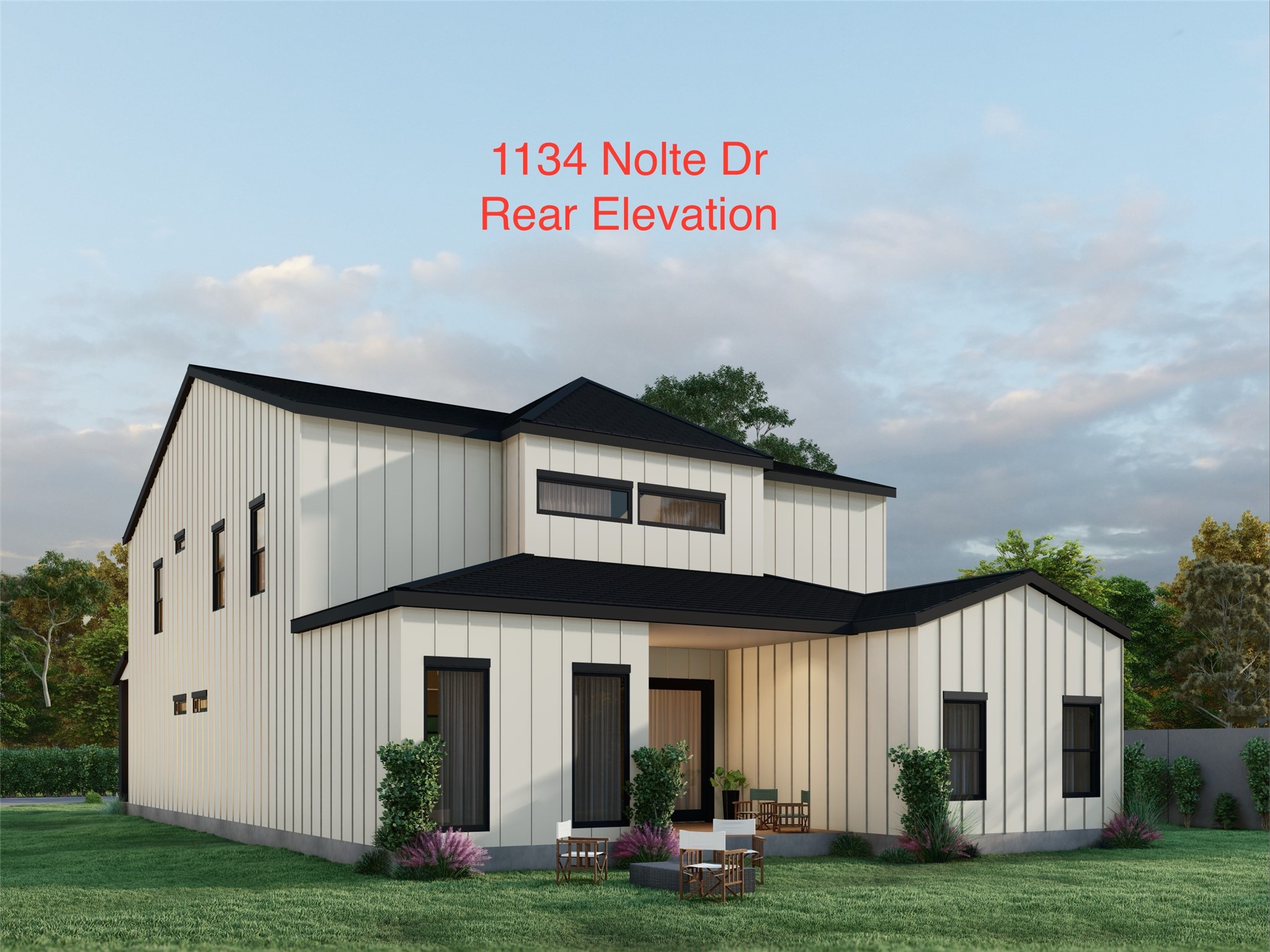 Rear of a modern two-story white home with black trim, a covered patio, lawn, and outdoor seating.