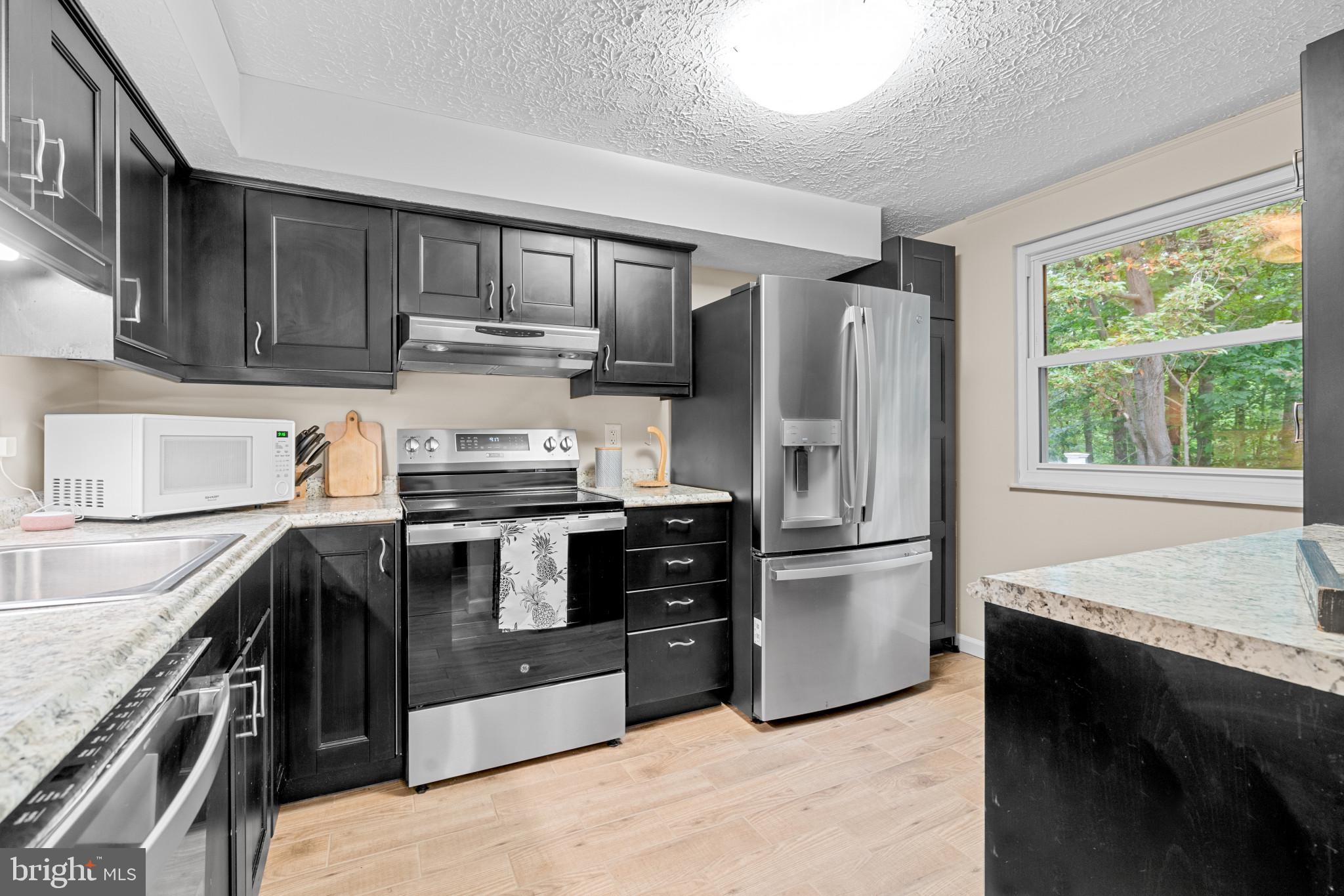 8232 Burning Forest Ct