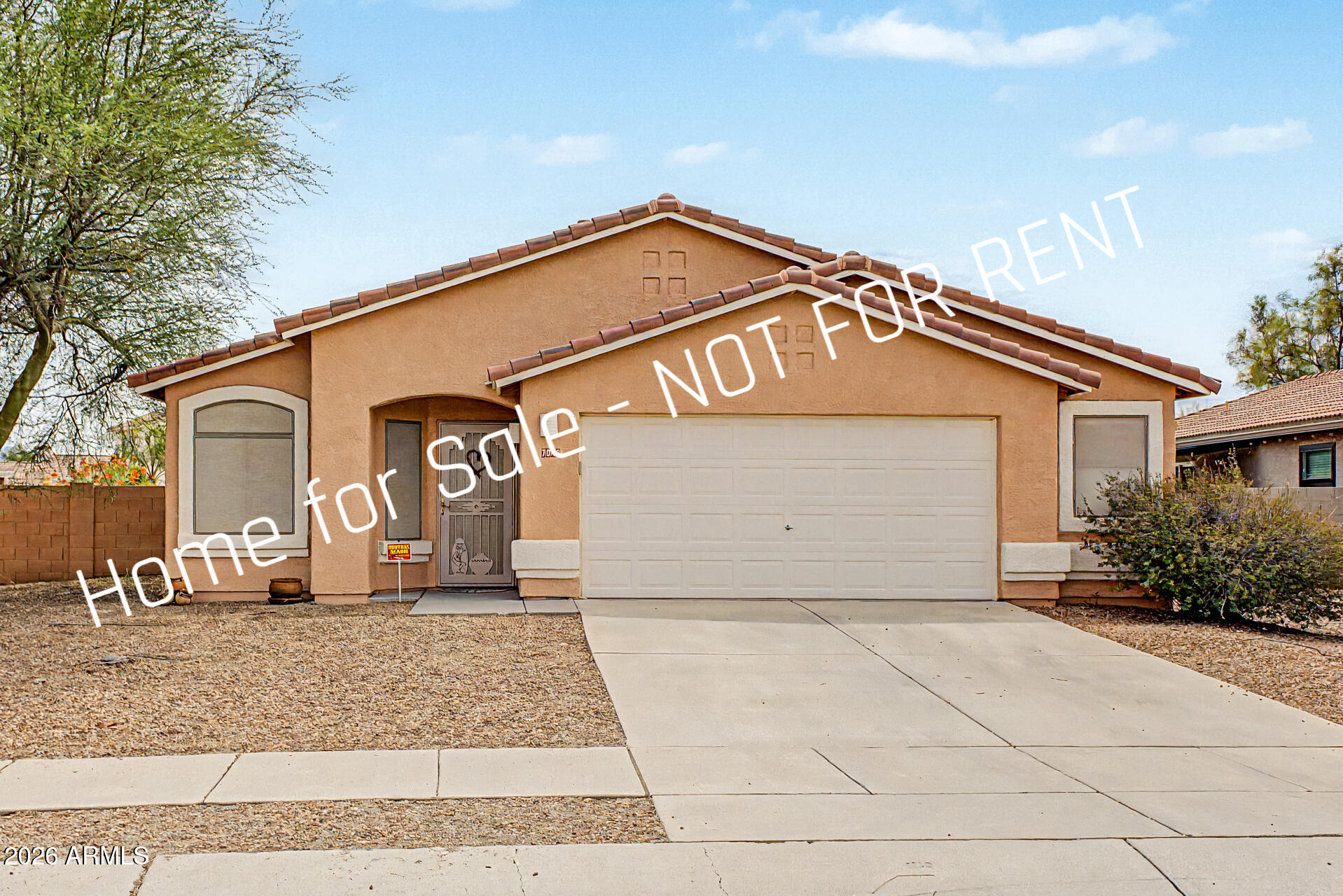 7043 W HARCUVAR Drive