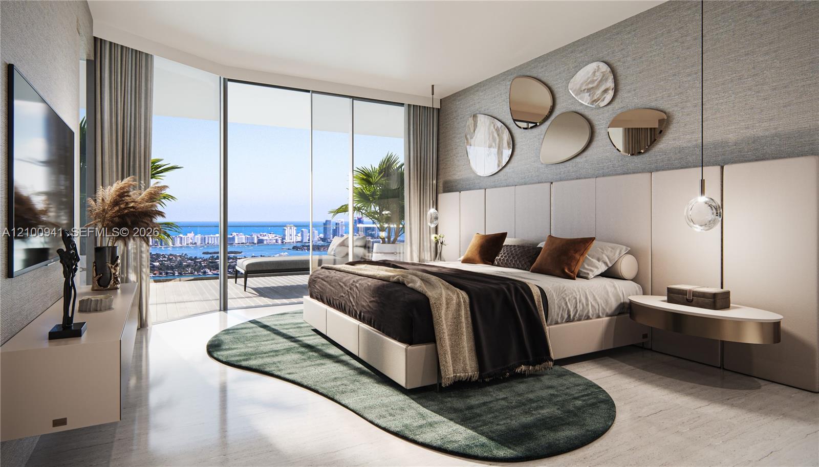 Modern bedroom with floor-to-ceiling windows overlooking Biscayne Bay and the Miami skyline.
