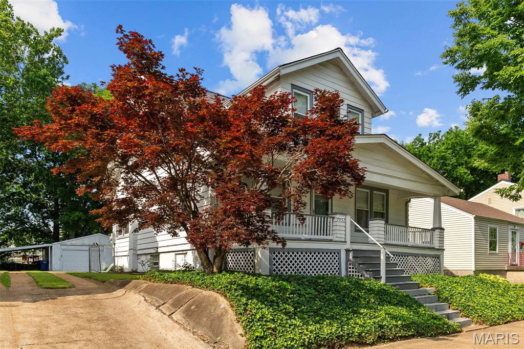 7052 Tholozan Avenue