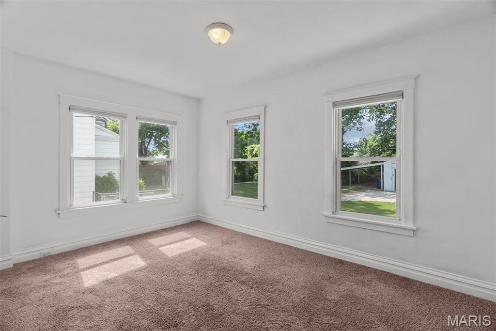 7052 Tholozan Avenue