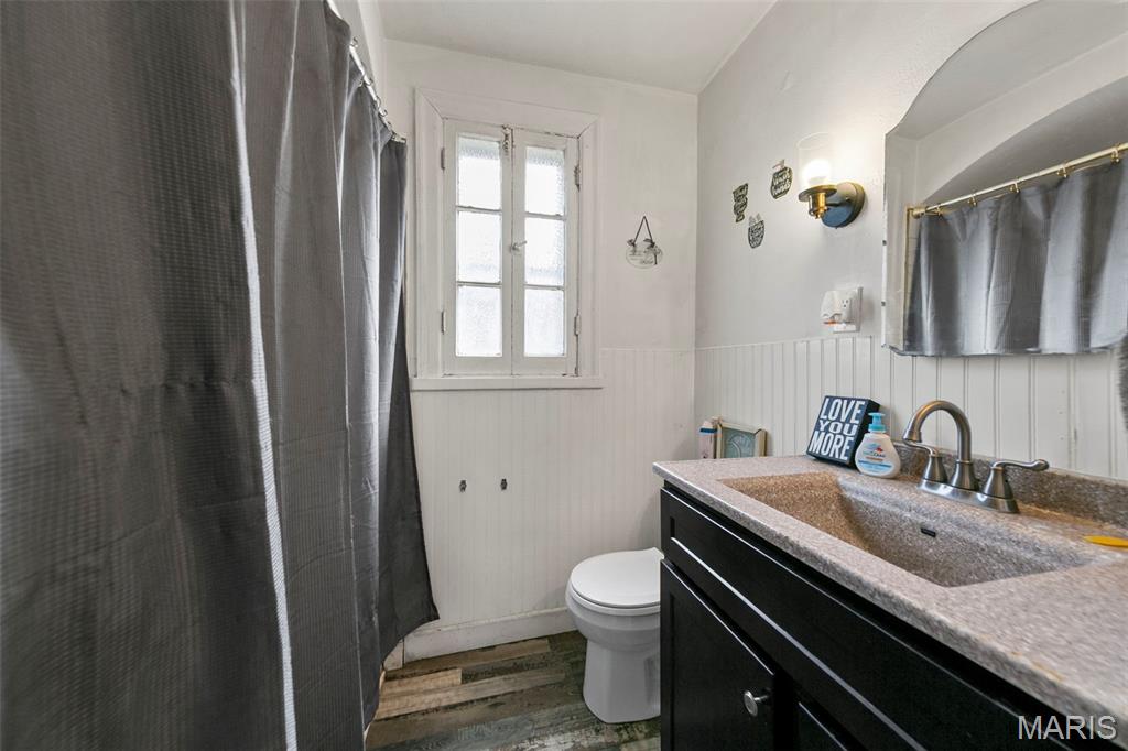 7117 W Florissant Avenue