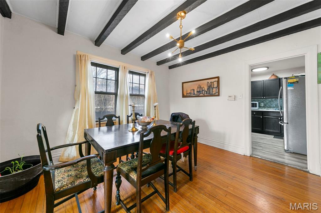 7117 W Florissant Avenue