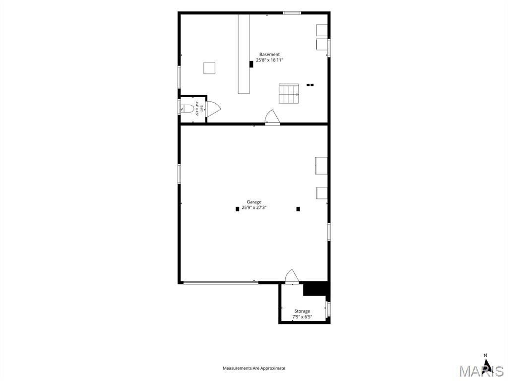 Floor plan showing a basement, large garage, and attached storage room with approximate dimensions.