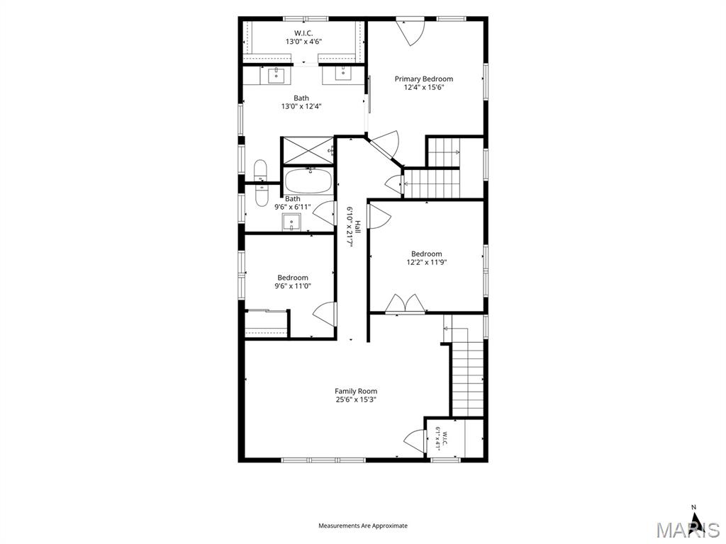 Home floor plan showing three bedrooms, two bathrooms, a large family room, closets, and stairs.