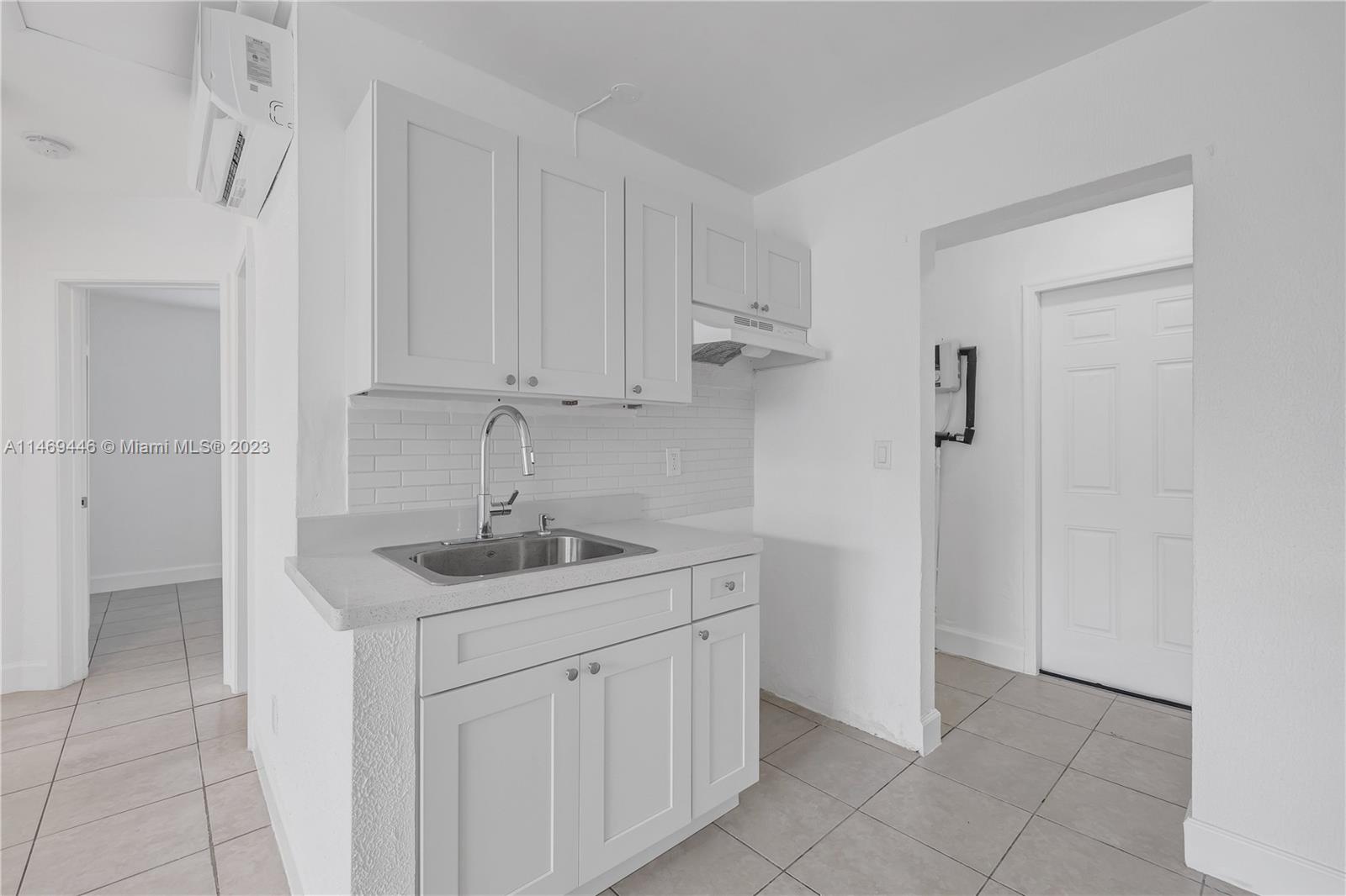 210 NW 9th Ave