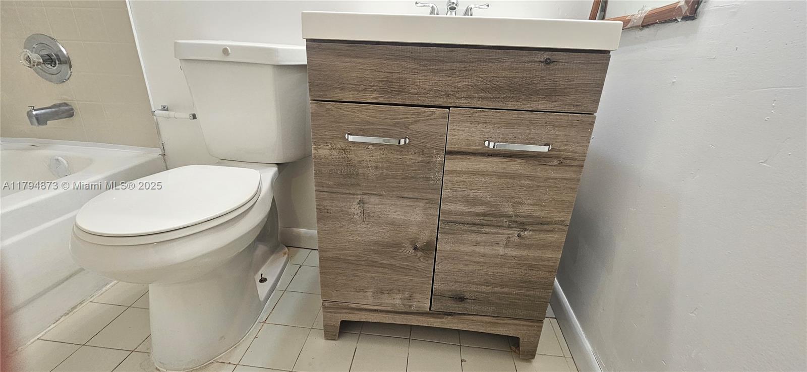 9001 Wiles Rd # 3 Unit: 103-3