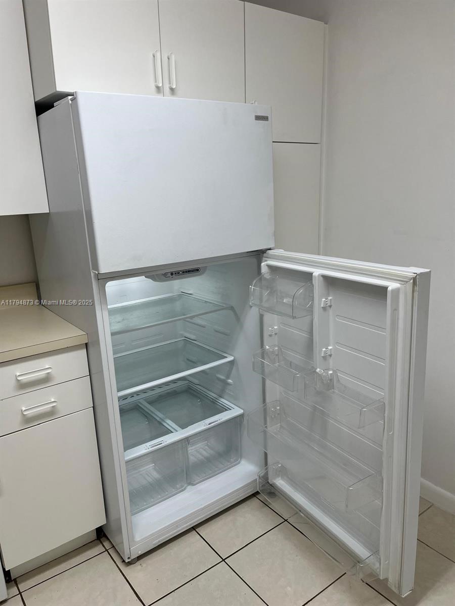 9001 Wiles Rd # 3 Unit: 103-3