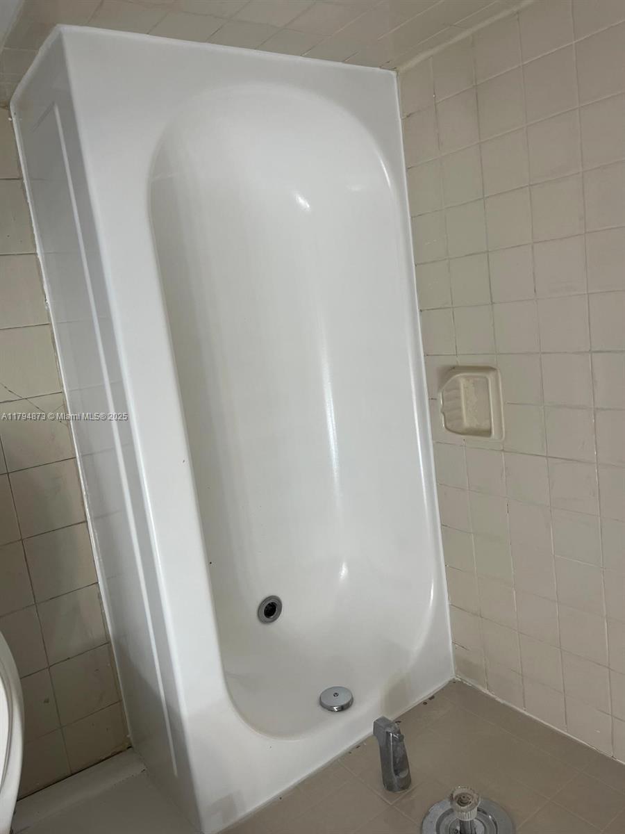 9001 Wiles Rd # 3 Unit: 103-3