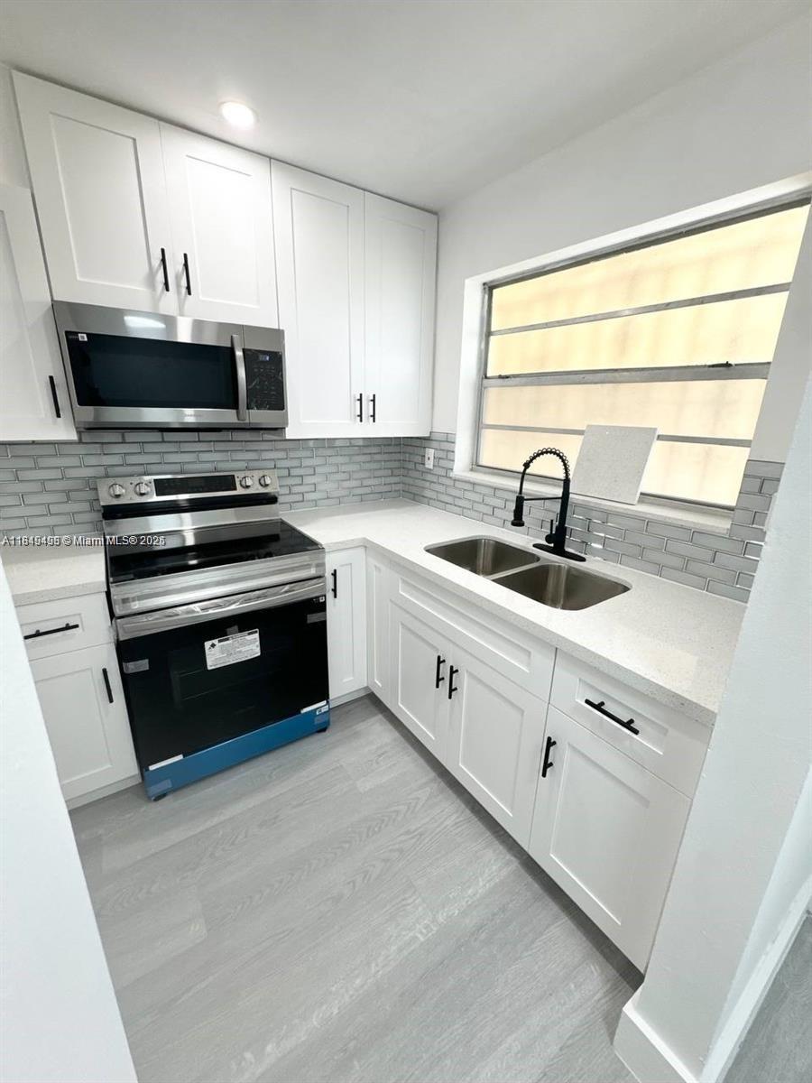 453 SW 2nd St # 304C