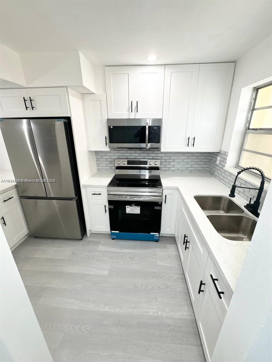 453 SW 2nd St # 304C