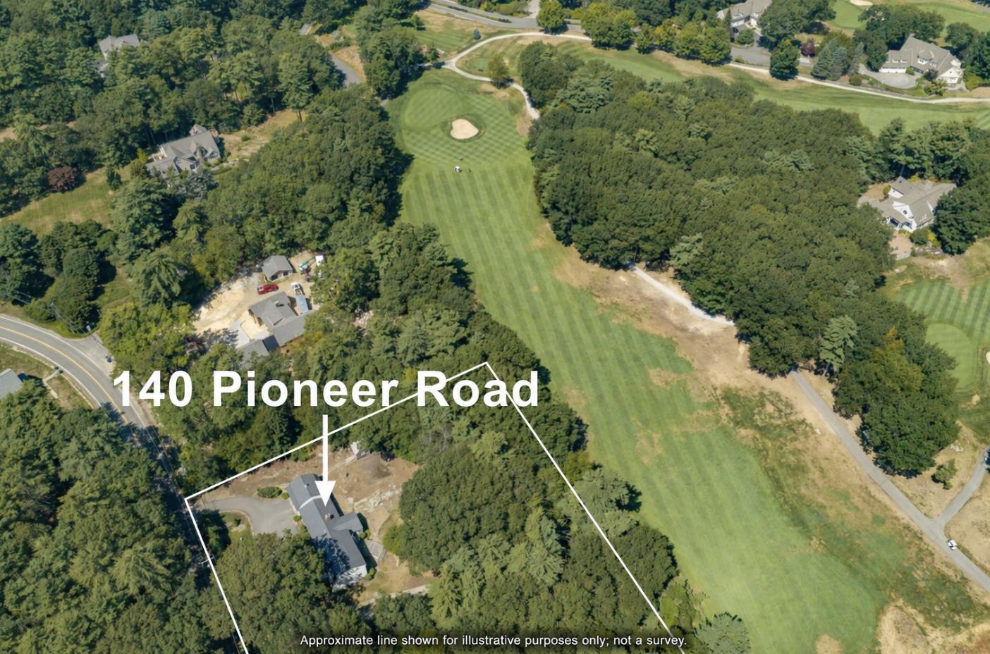 Aerial view of 140 Pioneer Road beside a golf course, with the wooded lot outlined.