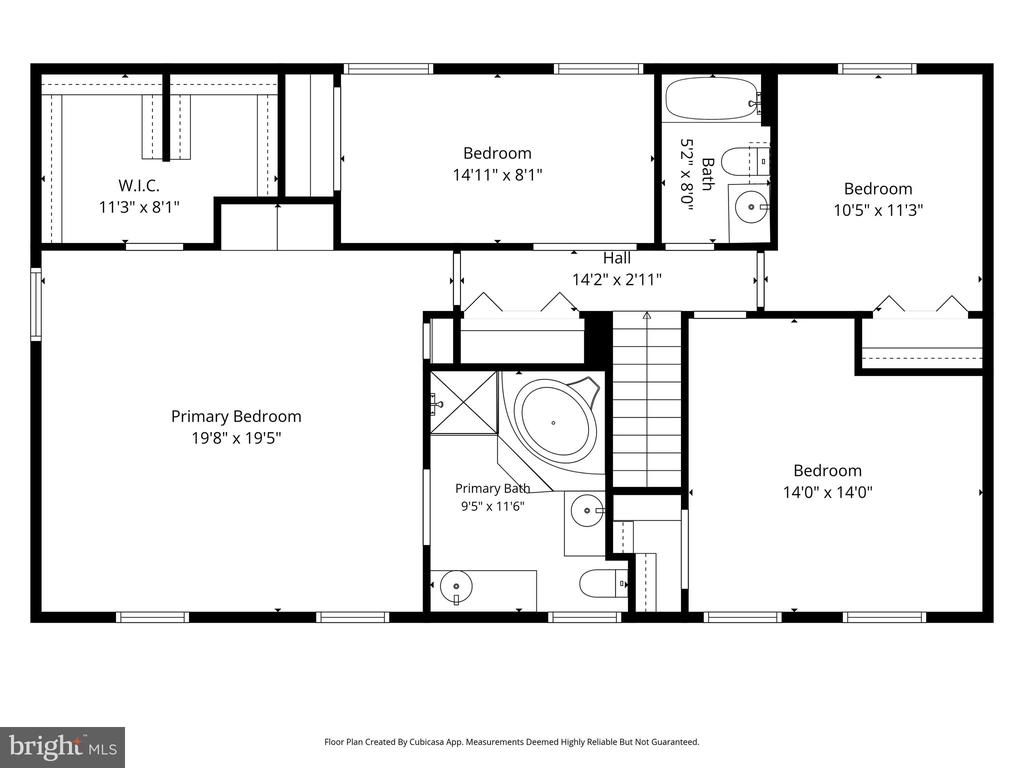 Floor plan showing four bedrooms, two bathrooms, a walk-in closet, and a central hall.