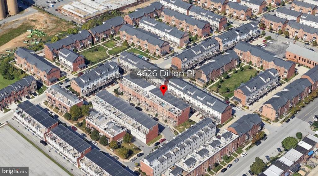 Aerial view of Baltimore rowhouses, with a map pin marking 4626 Dillon Place.