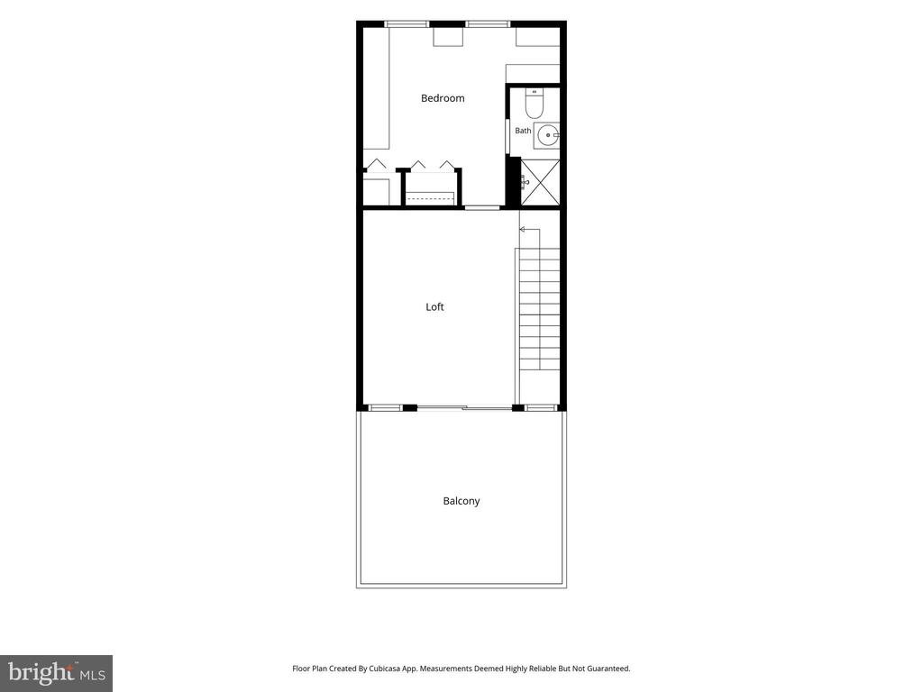 Floor plan showing a bedroom, bath, loft, stairs, and balcony.