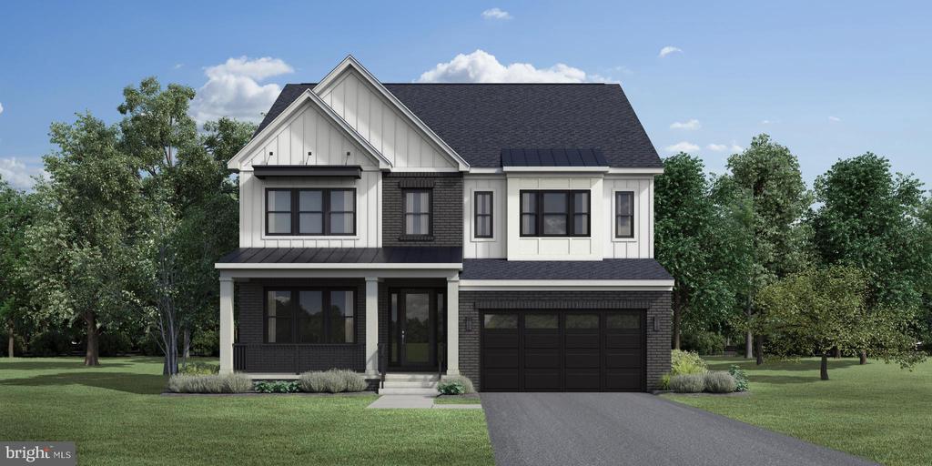 Two-story home with white siding, dark brick accents, a covered porch, and an attached two-car garage.