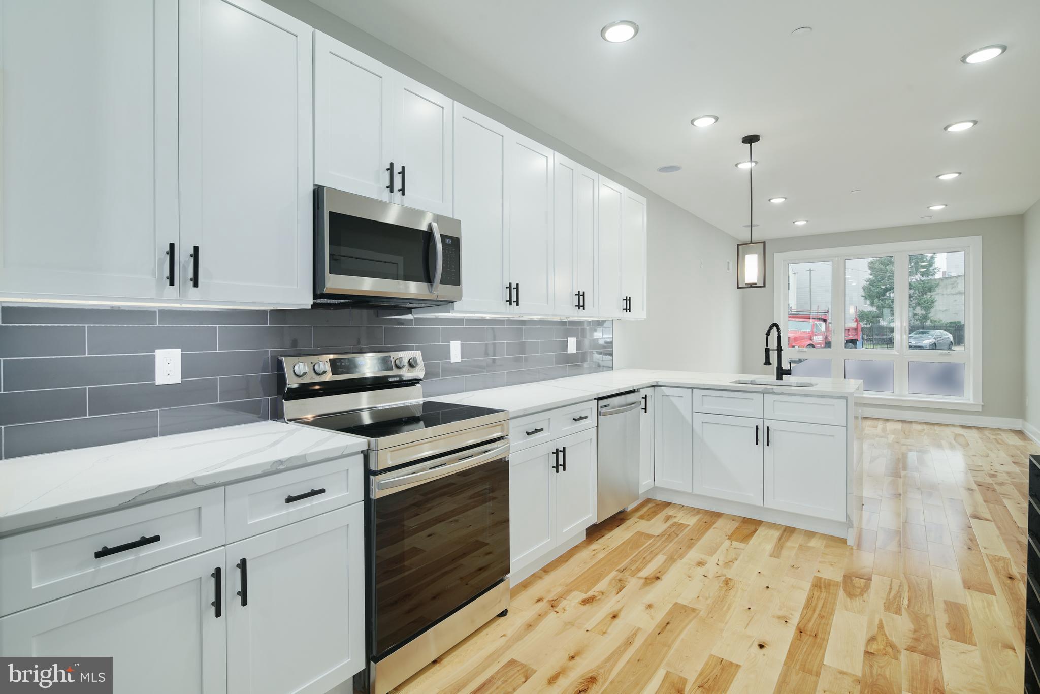 411 W HEWSON STREET 1