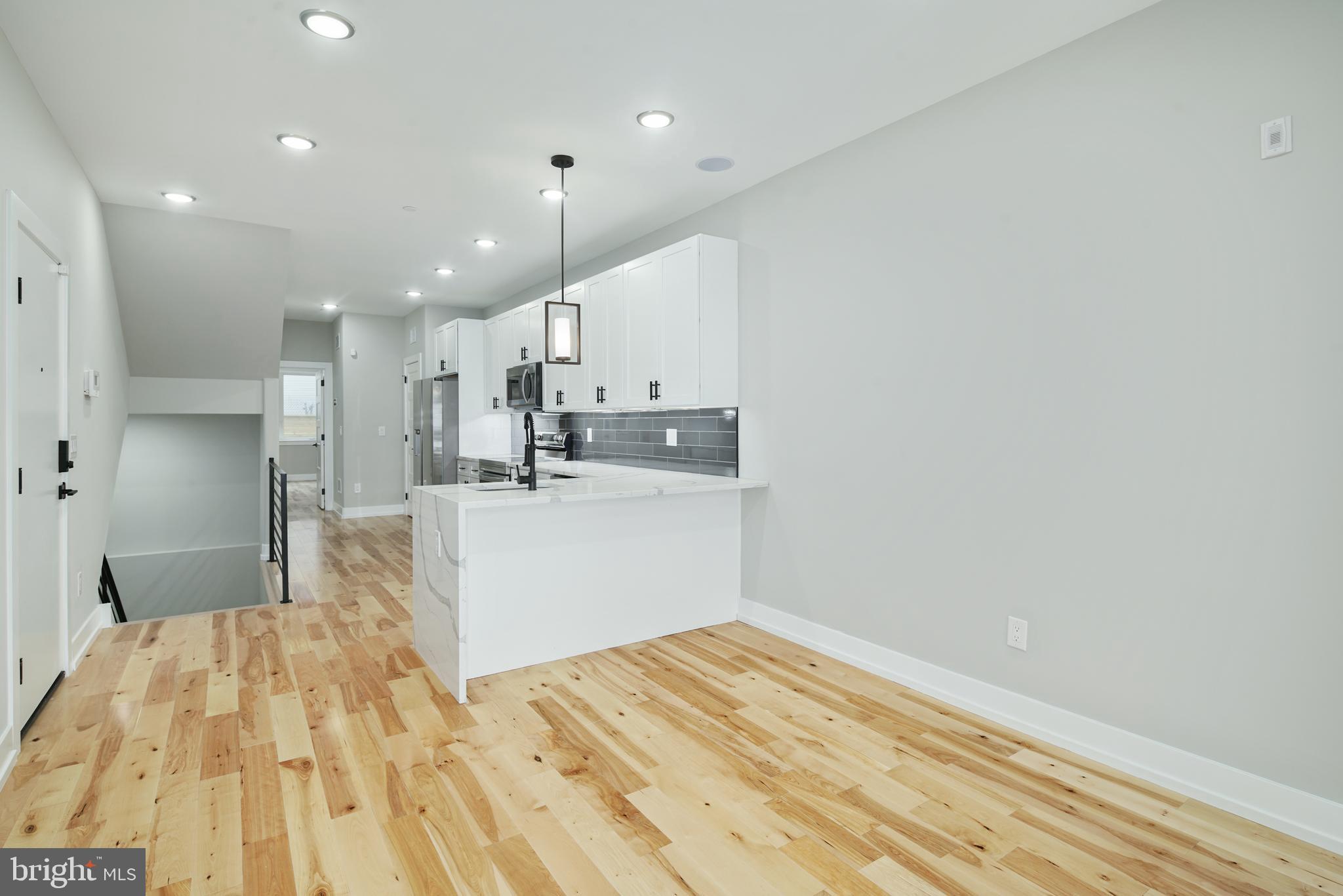 411 W HEWSON STREET 1