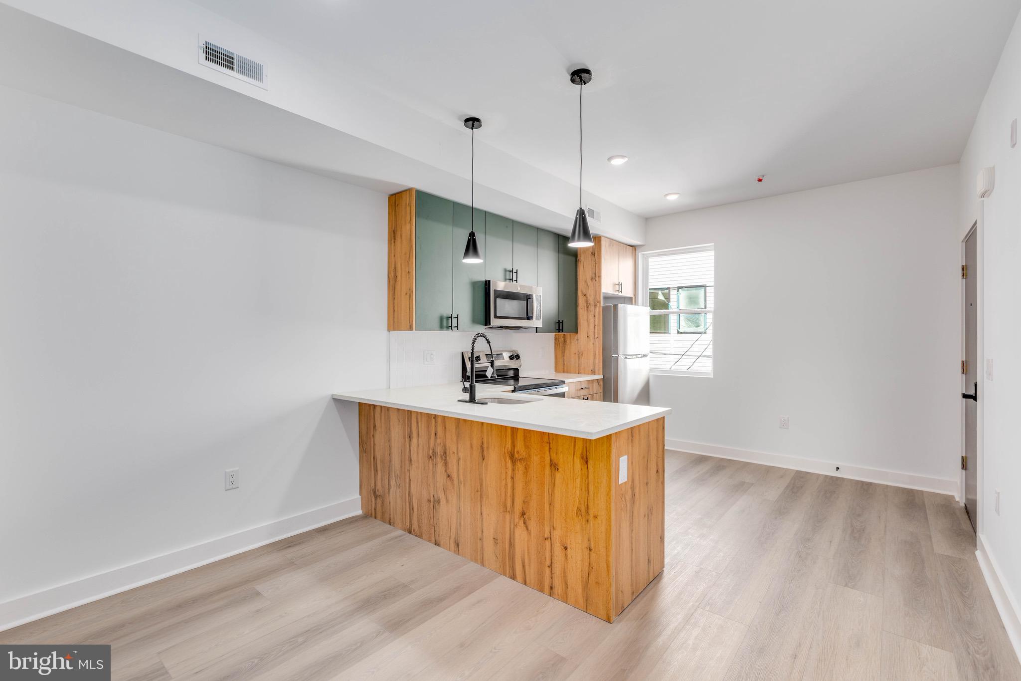 1221 W LEHIGH AVENUE 3