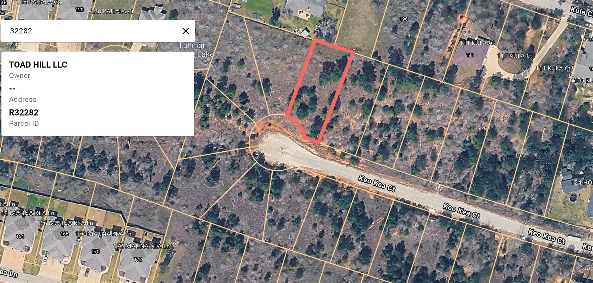Aerial parcel map with a red outline marking a wooded lot beside Keo Kea Ct.
