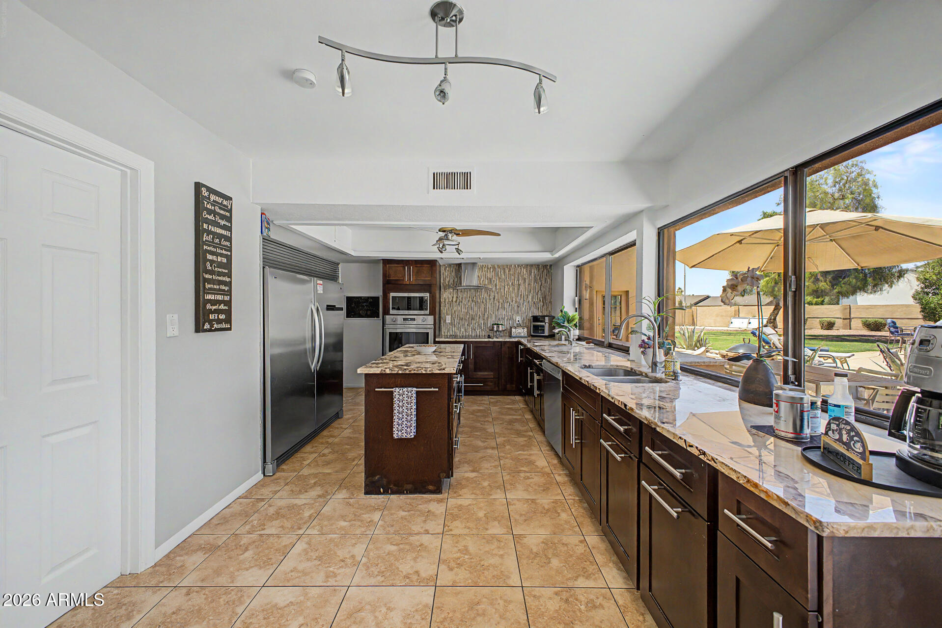 6002 E CORRINE Drive