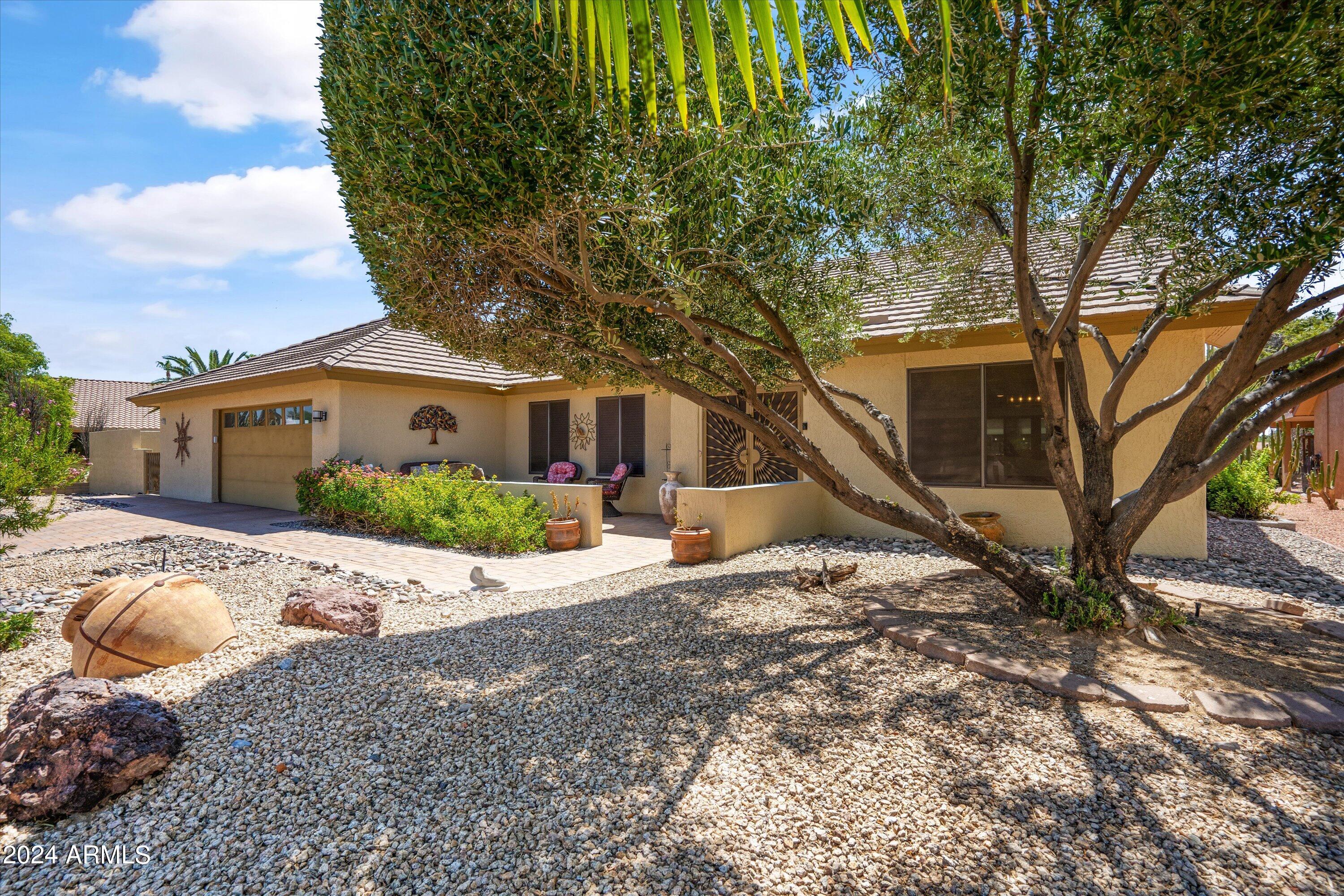 14203 W MEADOWOOD Drive