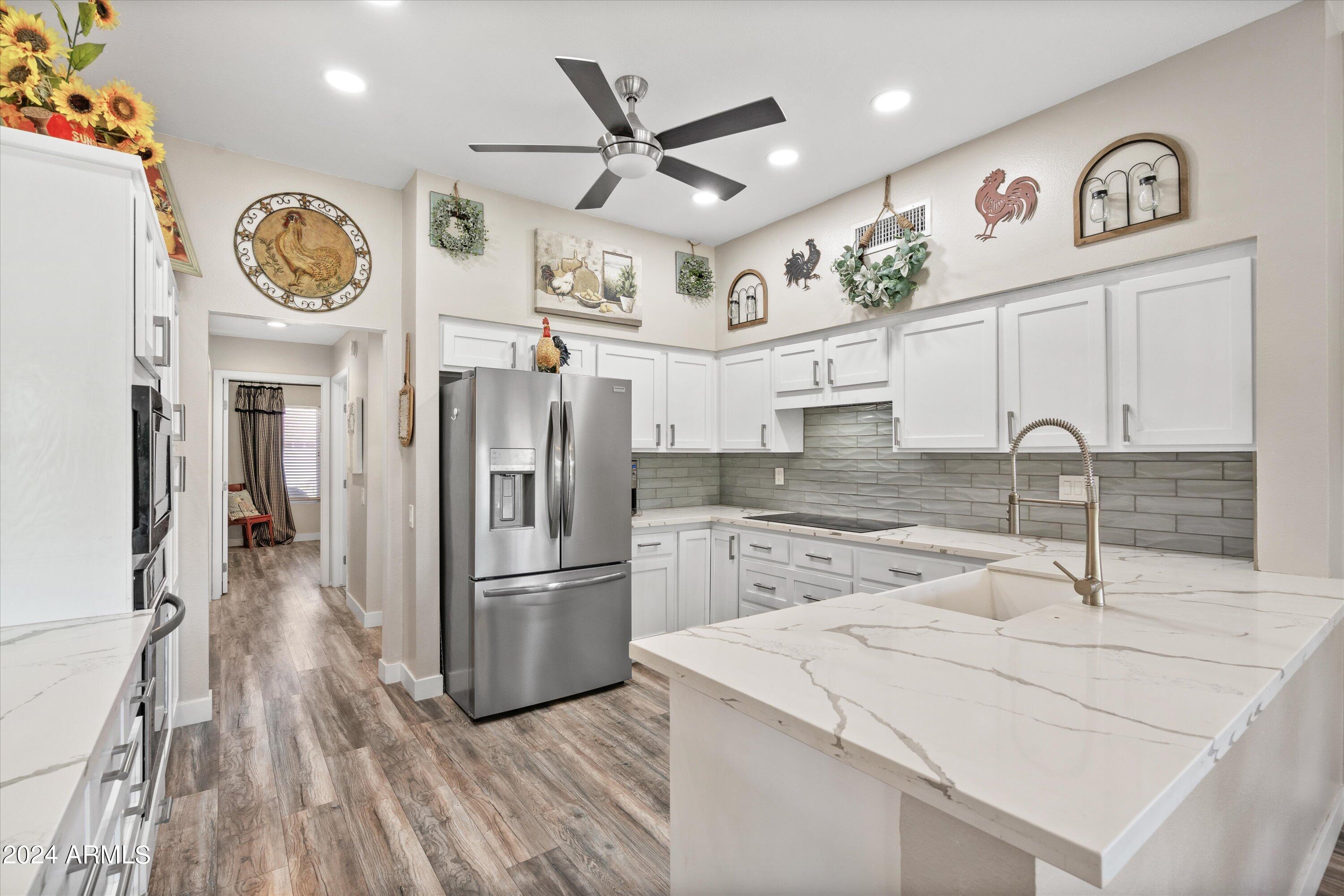 14203 W MEADOWOOD Drive