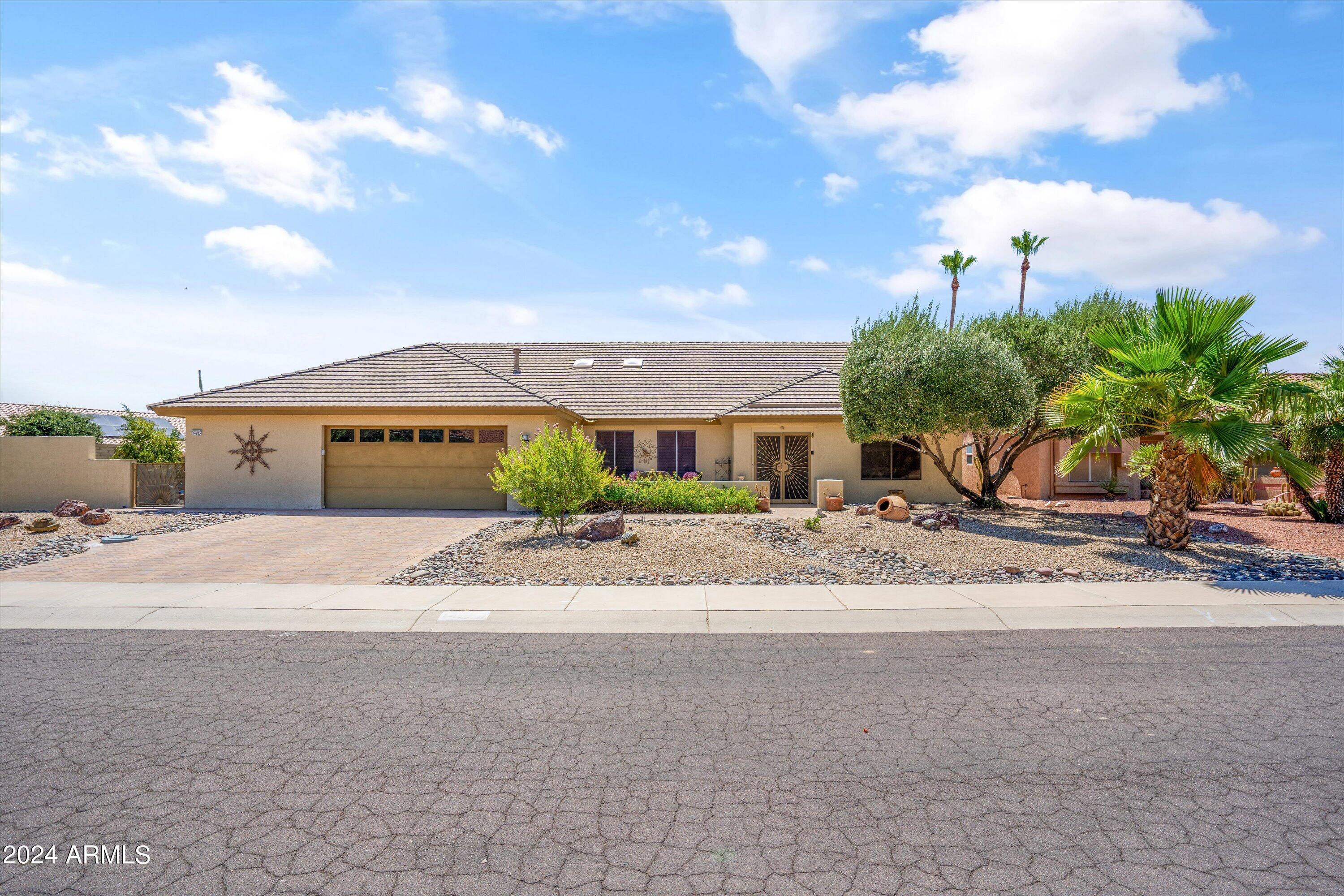 14203 W MEADOWOOD Drive