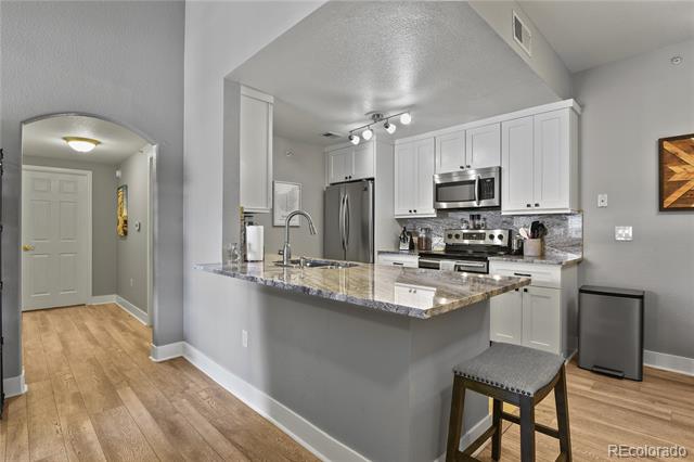 7440 S Blackhawk Street Unit: 1-303