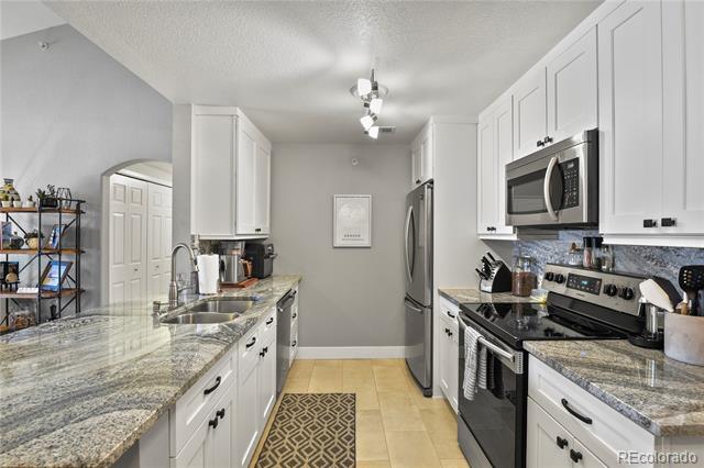 7440 S Blackhawk Street Unit: 1-303