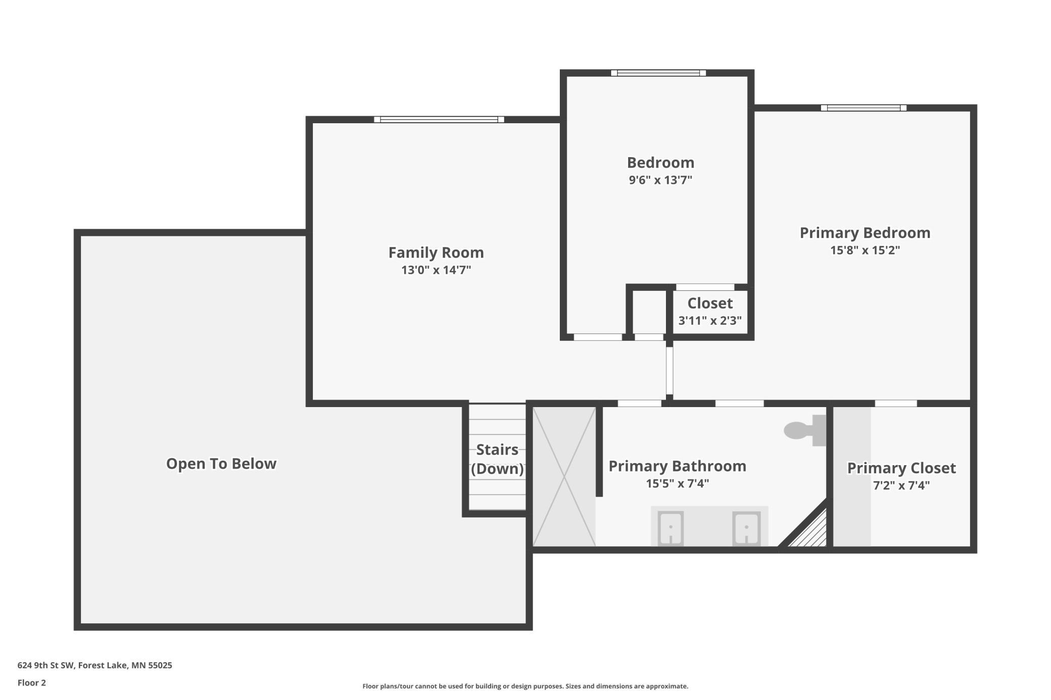Second-floor plan showing a family room, two bedrooms, primary bathroom, closets, stairs, and open-to-below area.