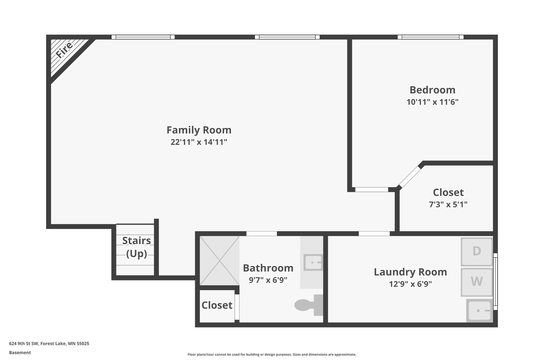 Basement floor plan showing a family room, bedroom, bathroom, laundry room, closets, and stairs.