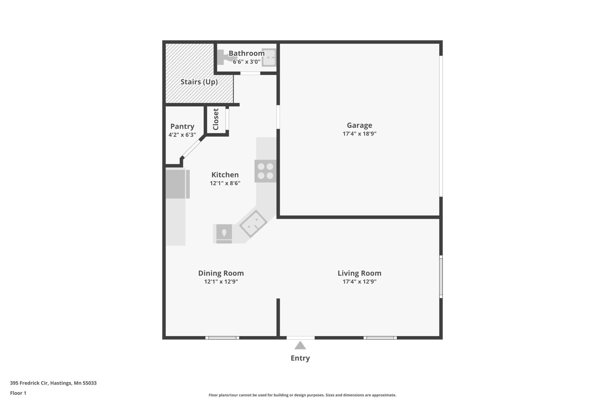 Floor 1 plan showing the kitchen, pantry, bathroom, garage, dining room, living room, entry, and stairs.