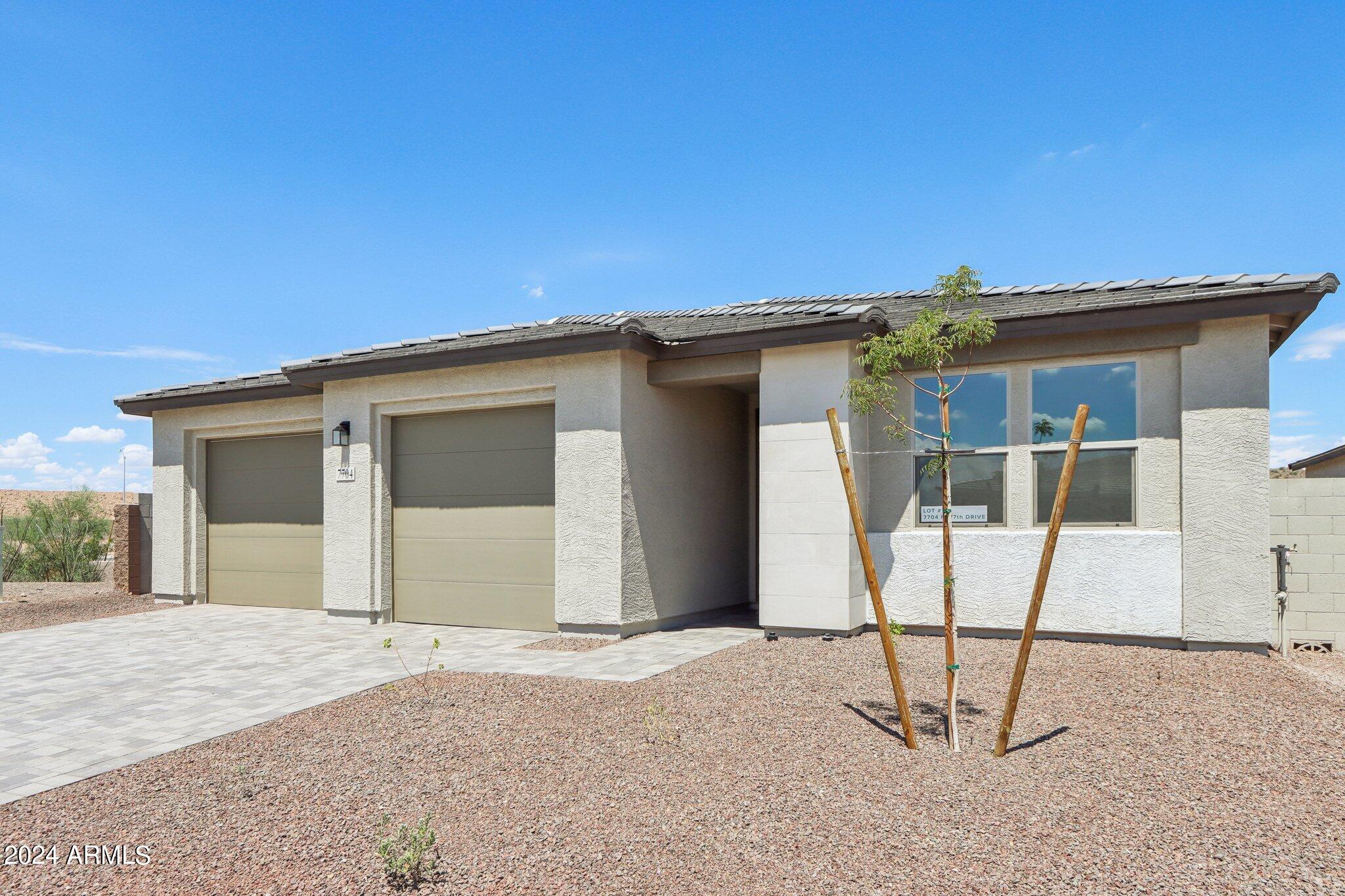 7704 W TETHER Trail