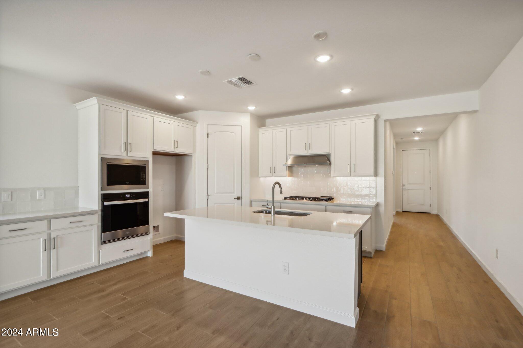 7704 W TETHER Trail