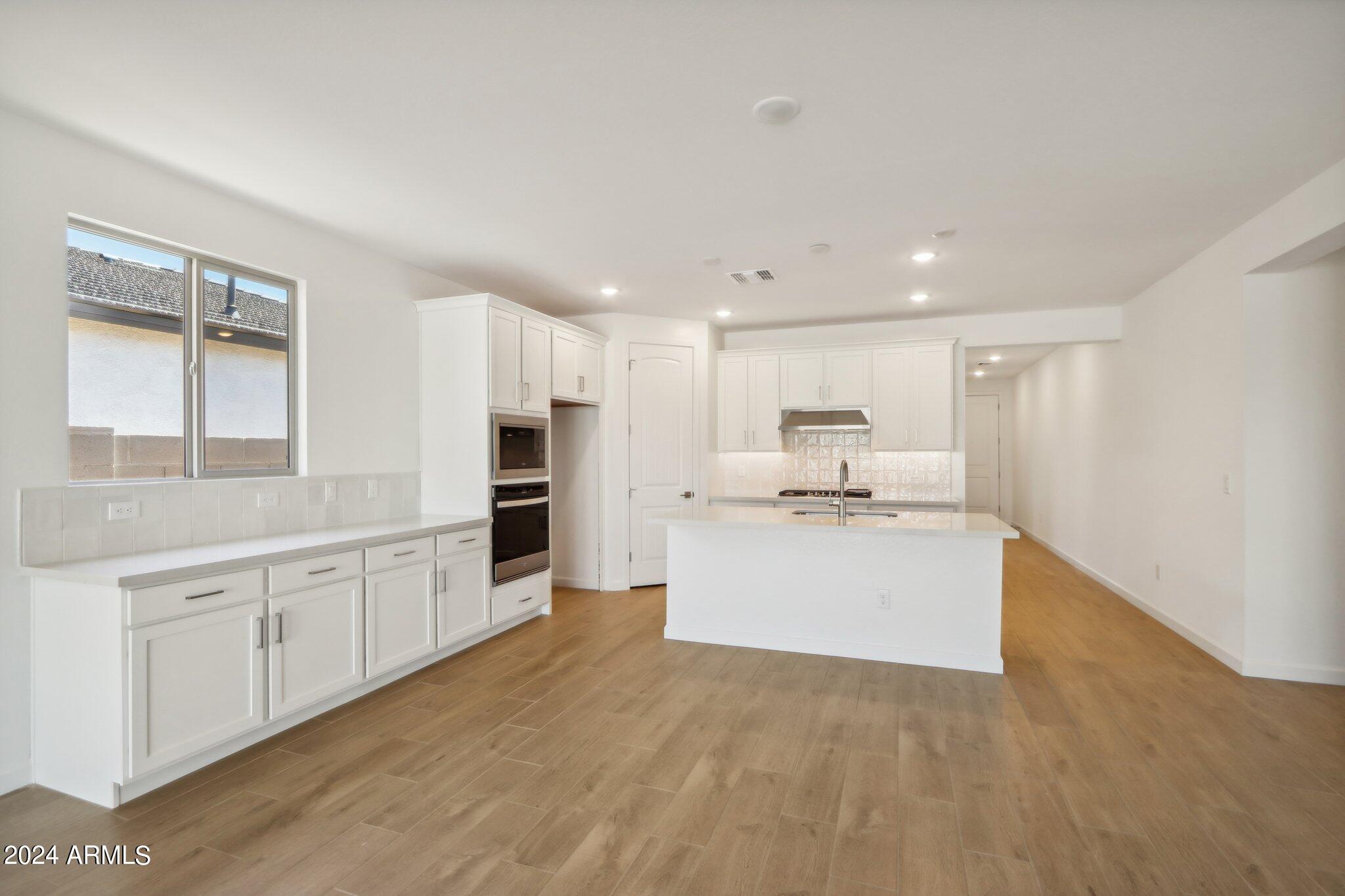 7704 W TETHER Trail