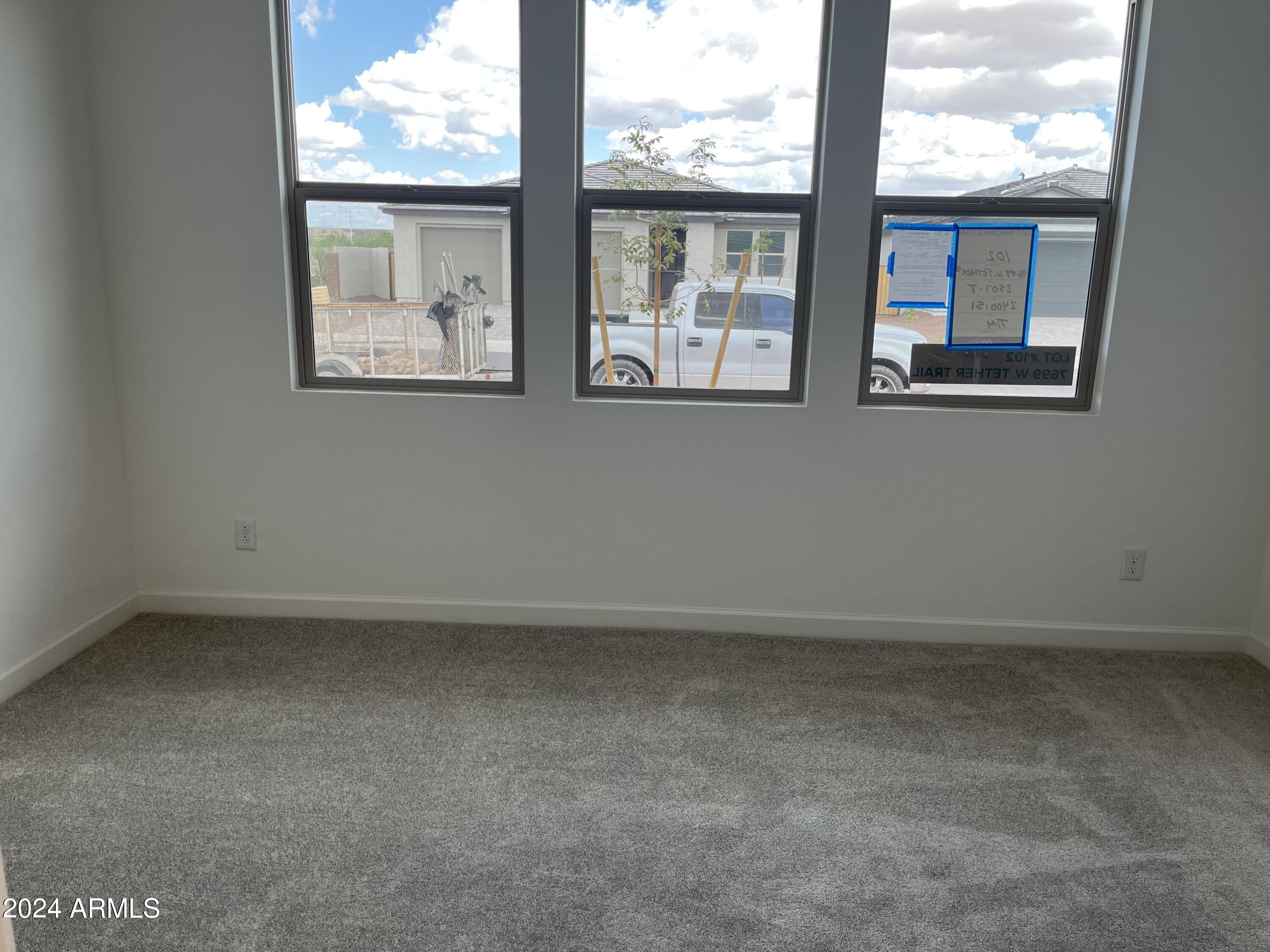 7699 W TETHER Trail