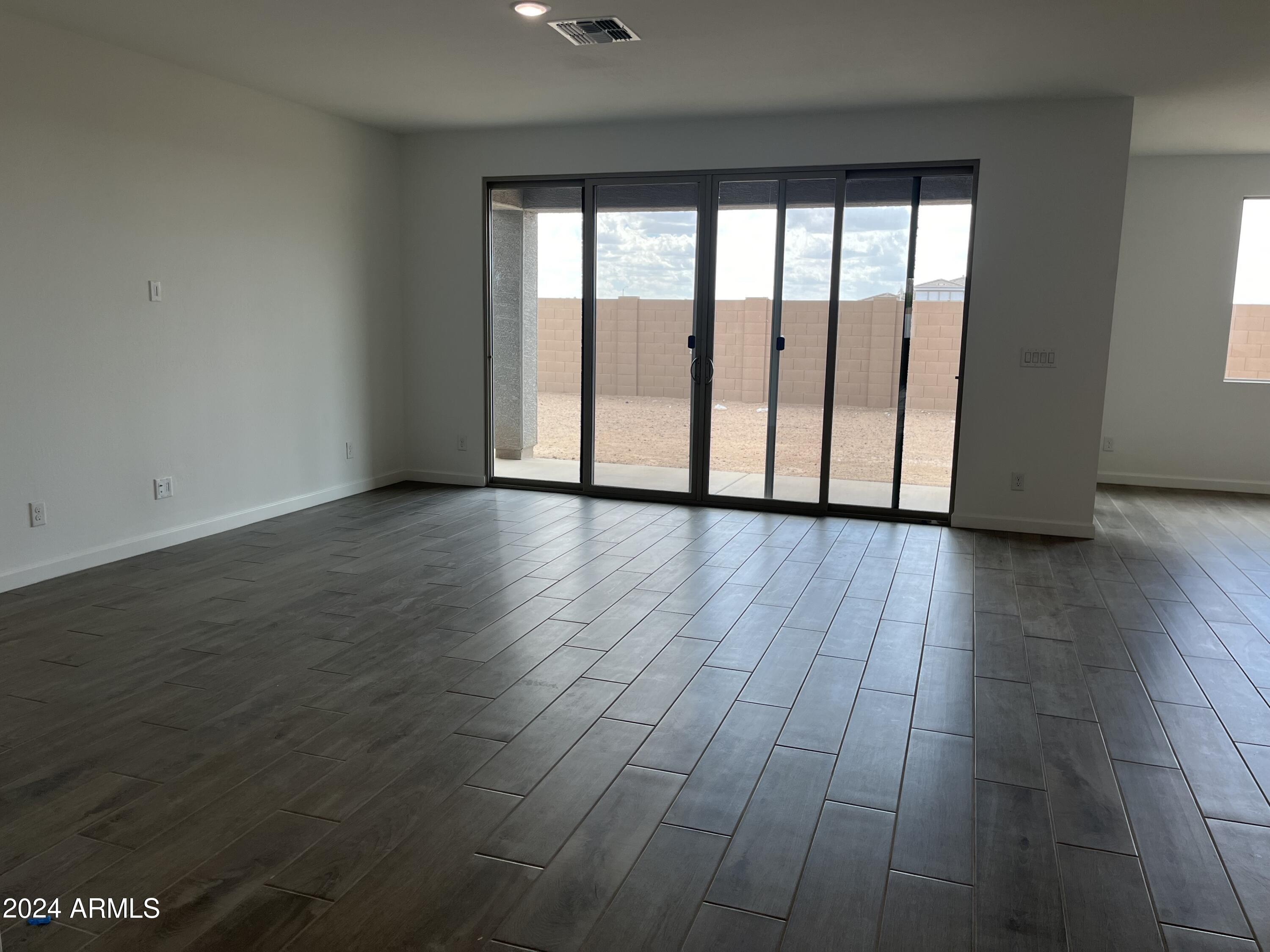 7699 W TETHER Trail
