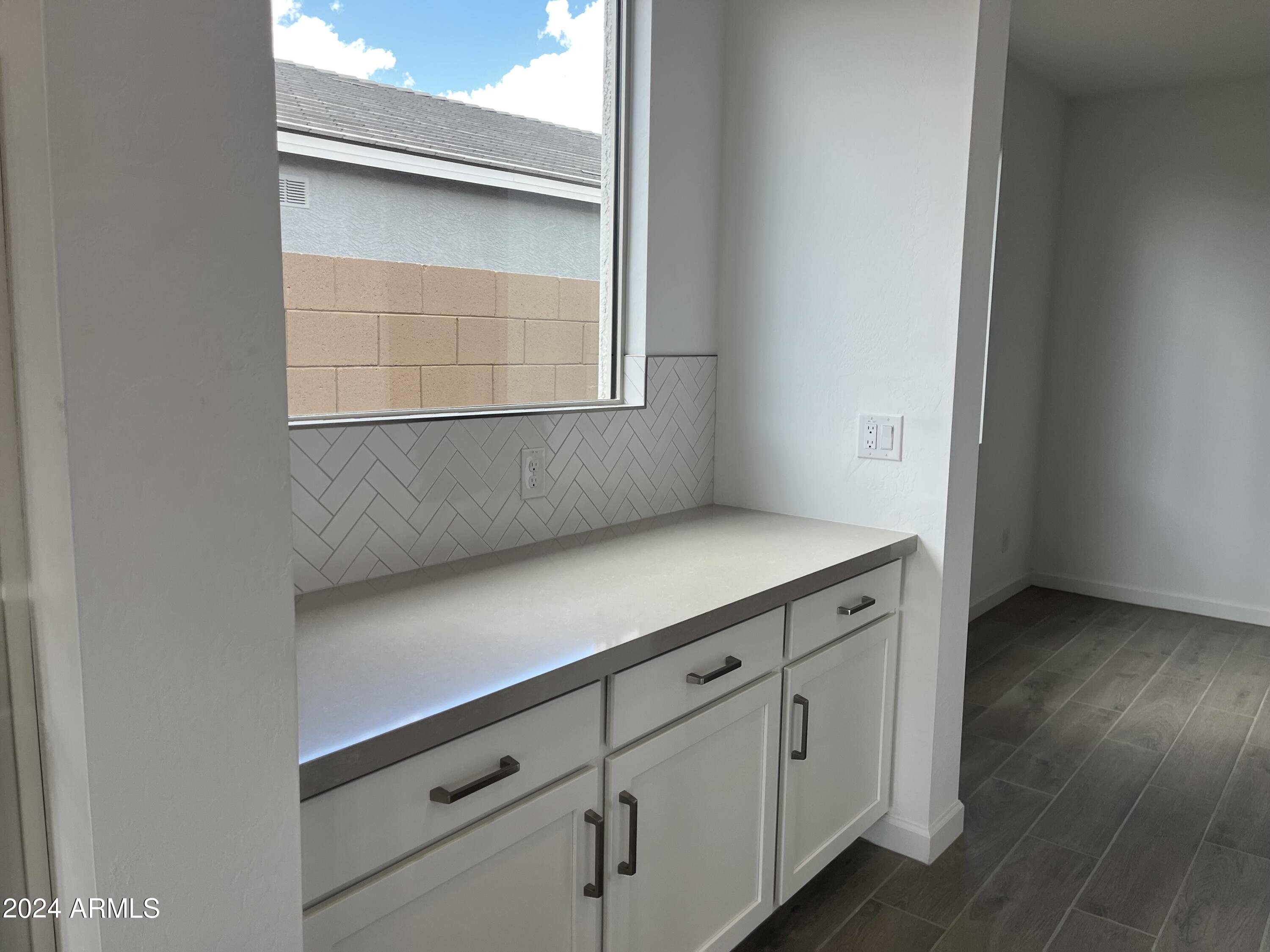 7699 W TETHER Trail