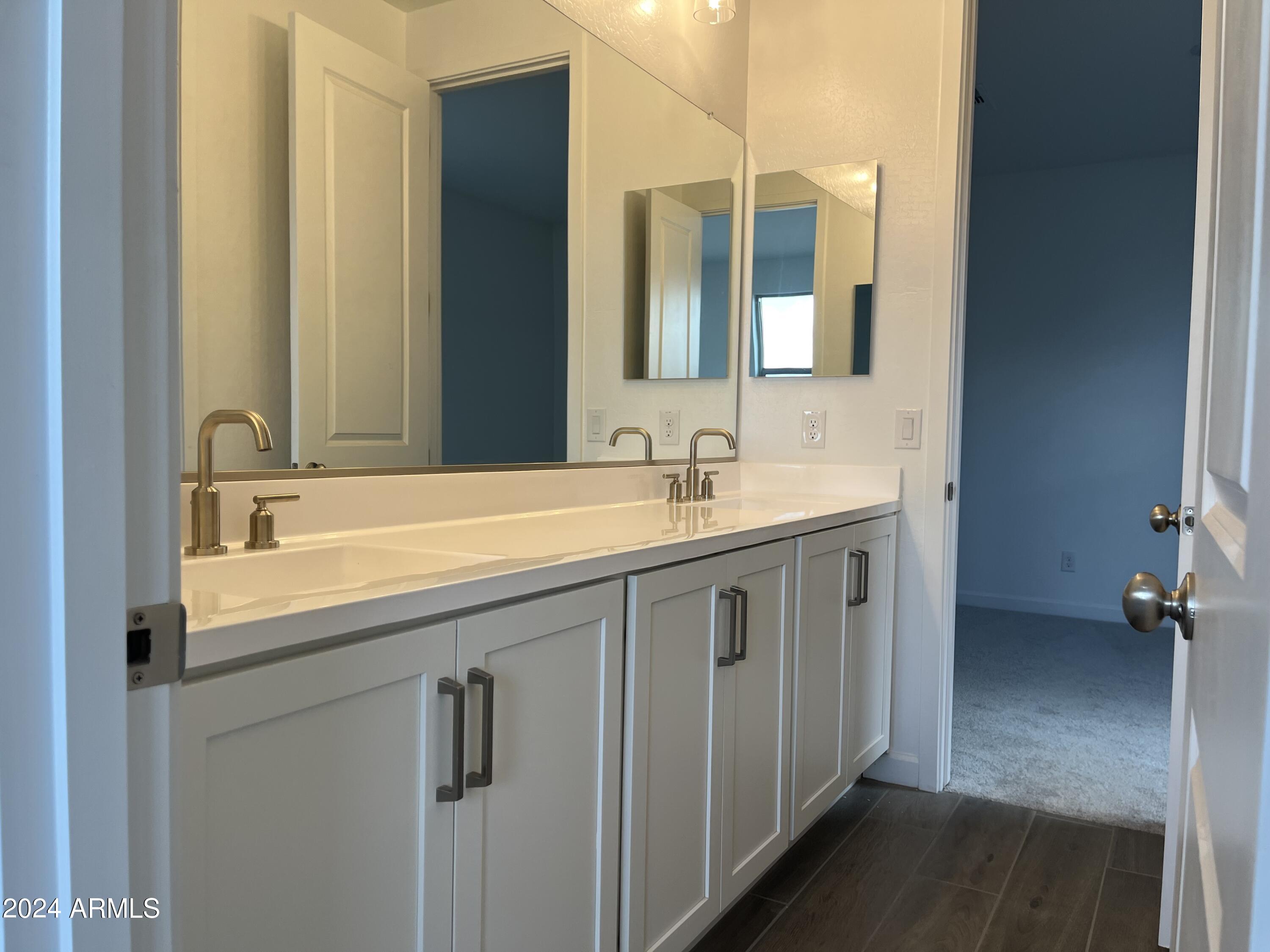 7699 W TETHER Trail