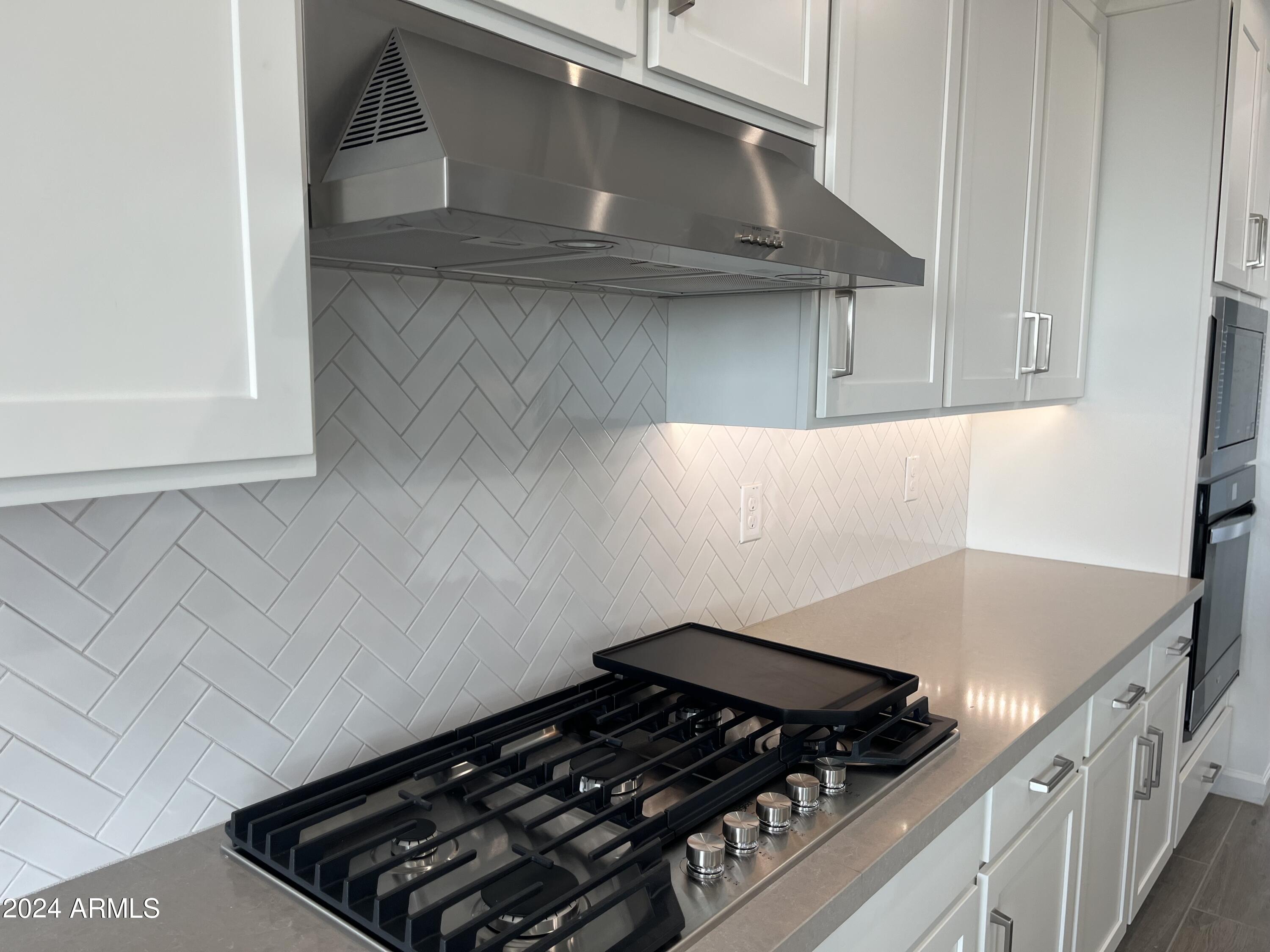 7699 W TETHER Trail