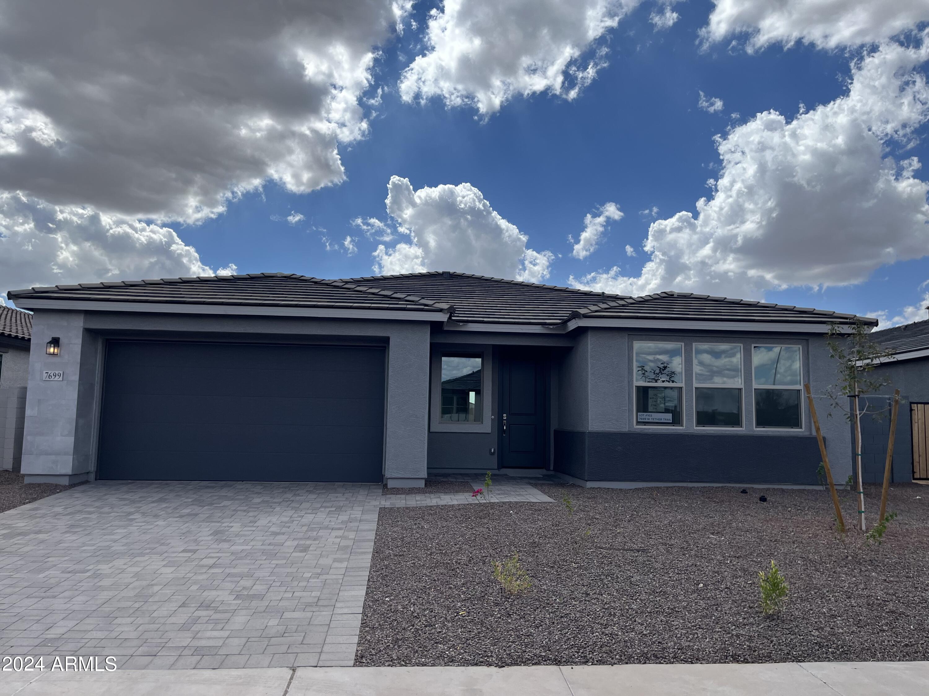 7699 W TETHER Trail