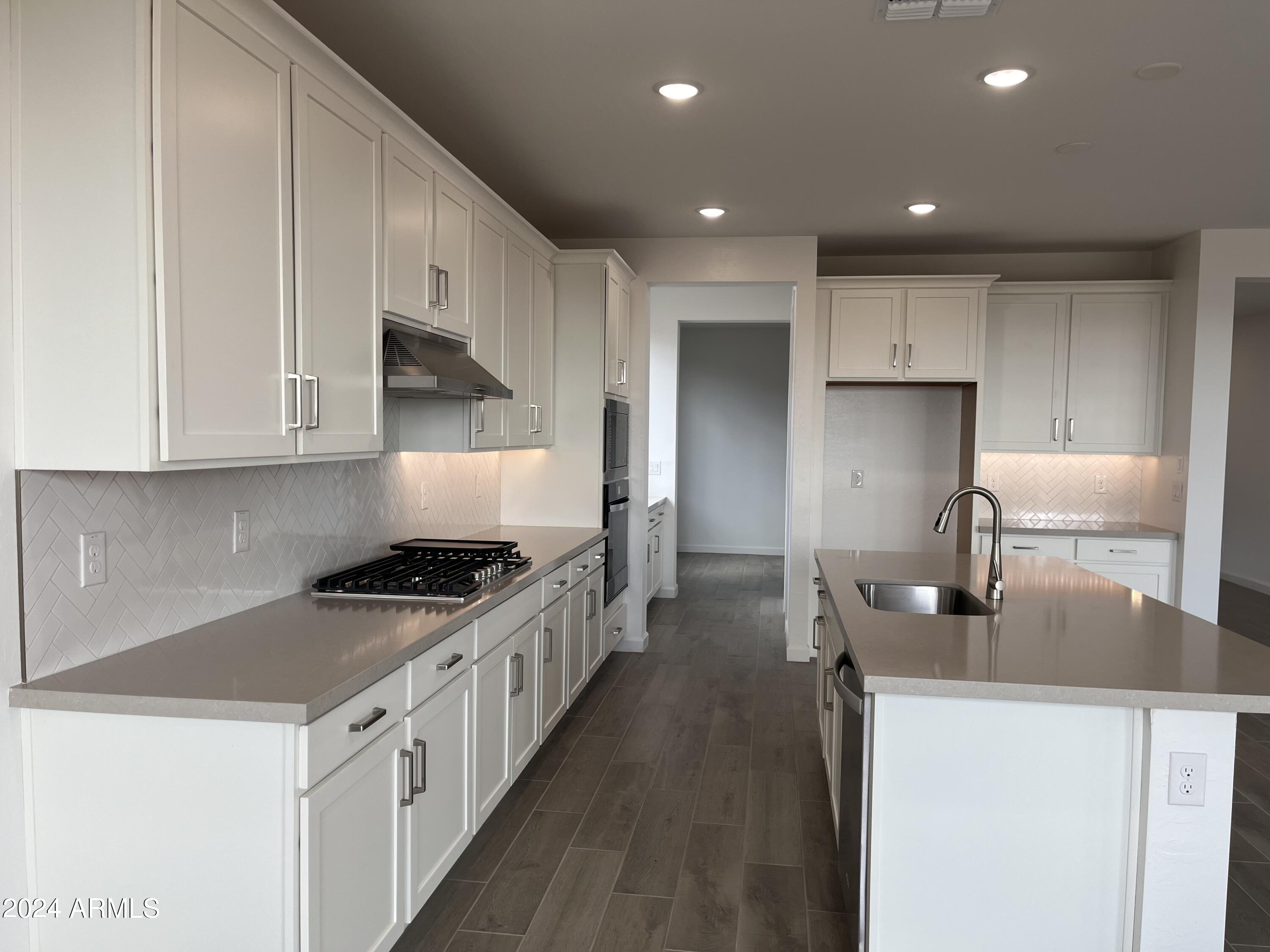 7699 W TETHER Trail