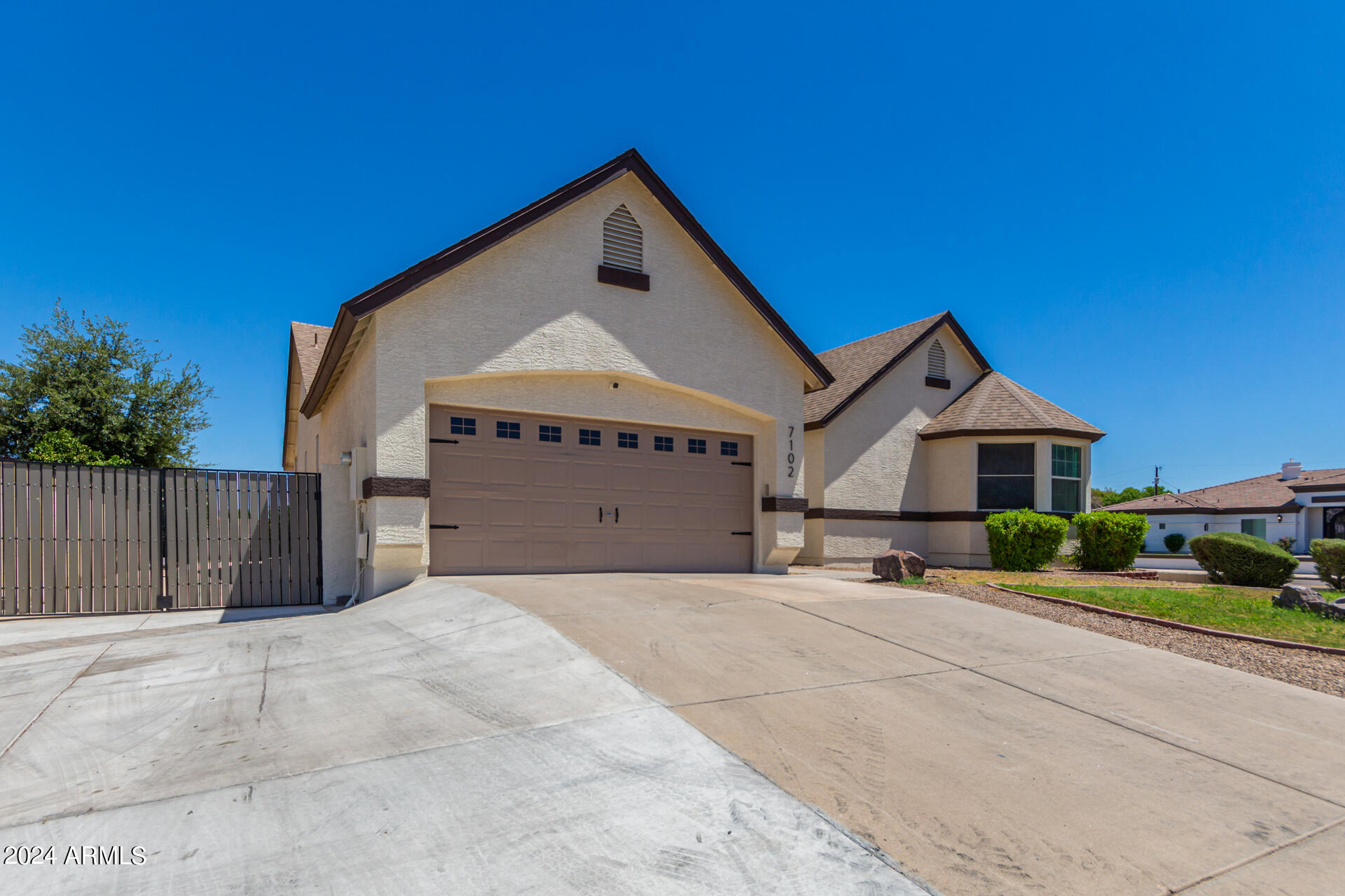 7102 W WINDROSE Drive