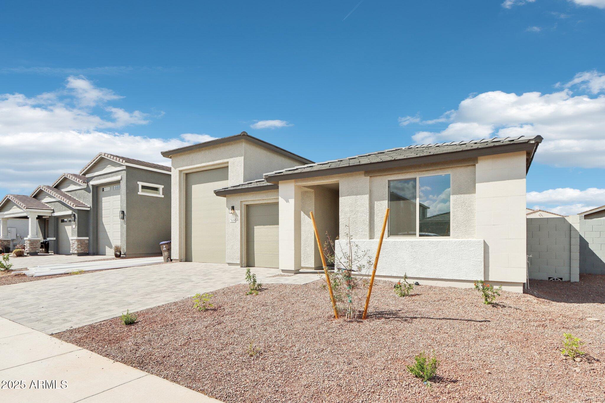 7654 W TETHER Trail