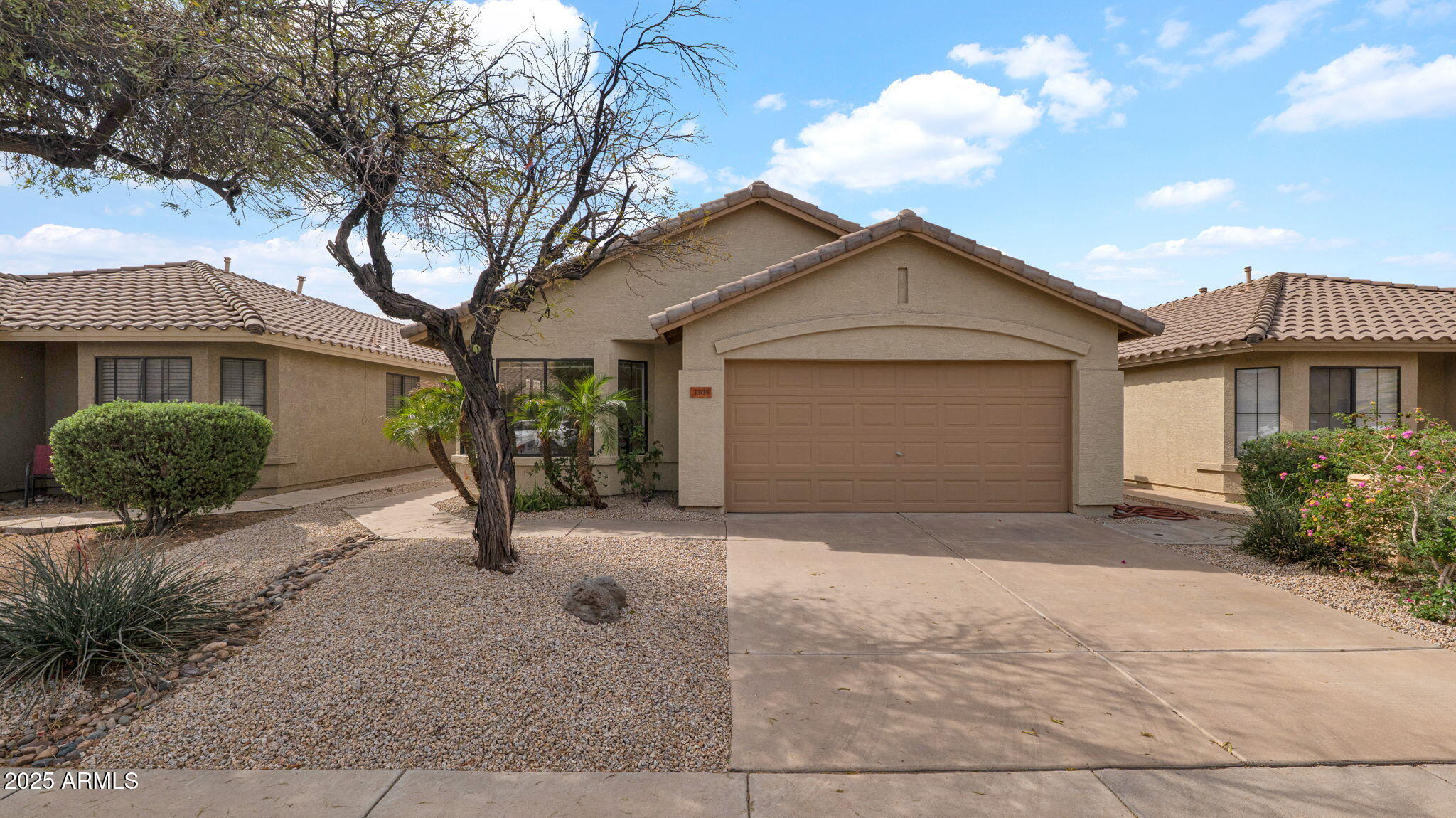 3305 E HONONEGH Drive