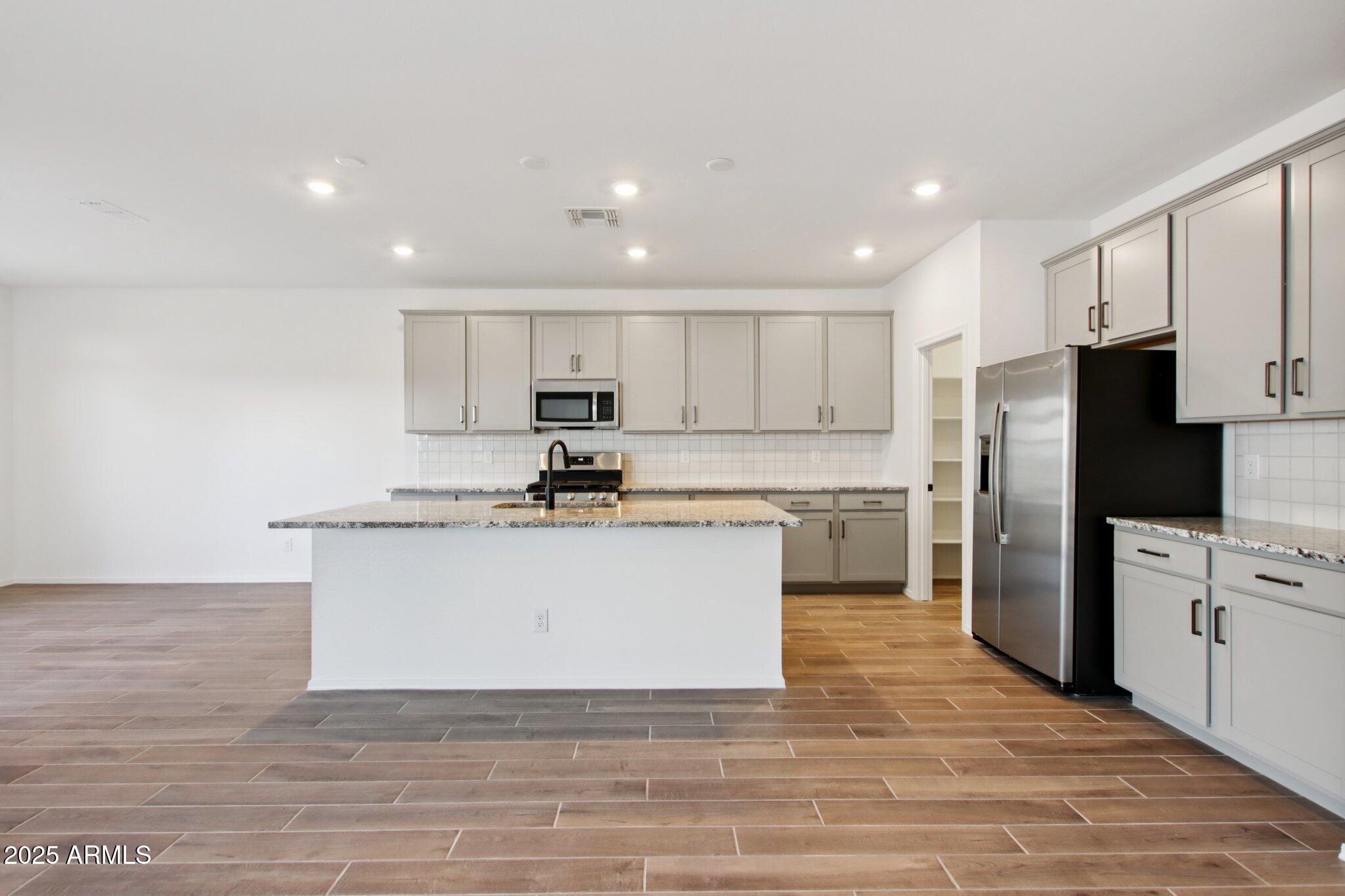 47235 W PECAN WOODS