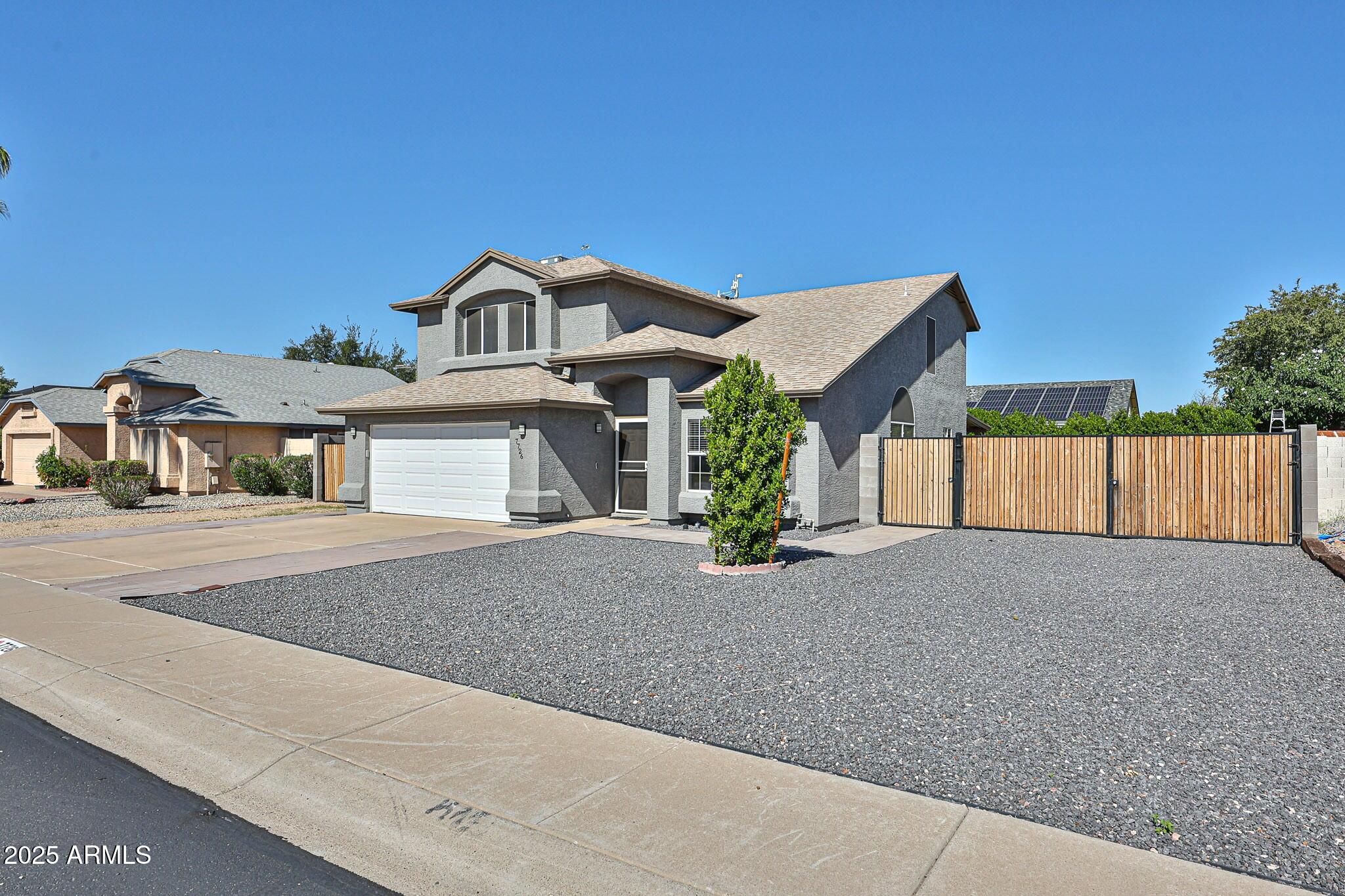 7726 W CHERYL Drive